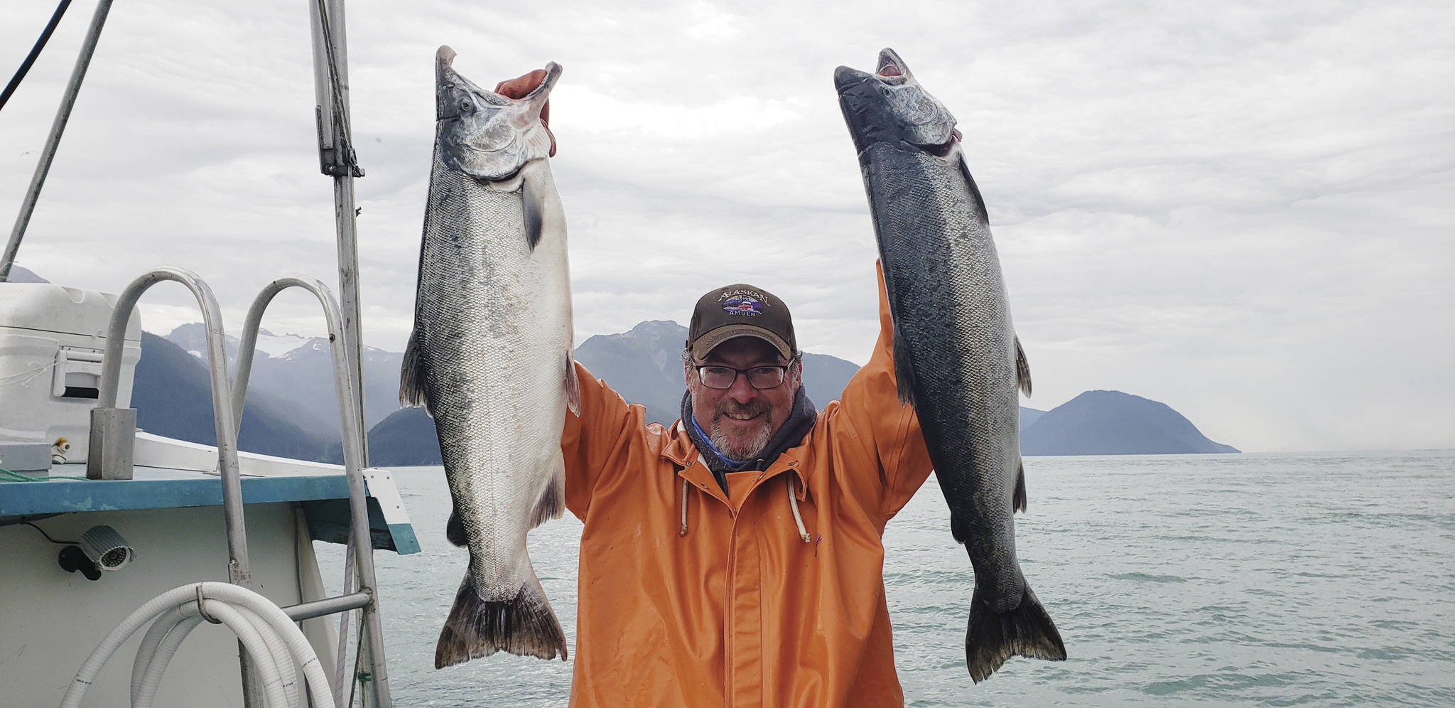 Courtesy Photo / Holly A. Heyser
Hank Shaw holds coho salmon caught on the Taku River. Shaw, a hunter, angler, gardener, chef and award-winning writer, is in town this week to promote his new book “Hook, Line, and Supper.”