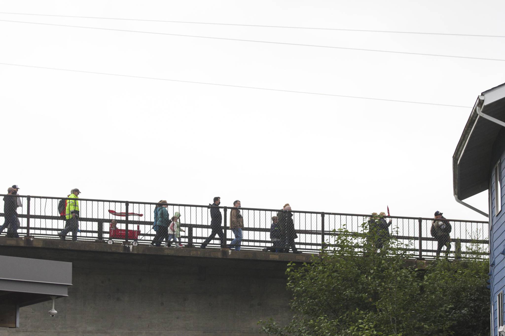 Juneau residents and veterans gathered on Tuesday, Aug. 24, 2021 for Together with Juneau Veterans’ first Walk with a Vet event across the Douglas Bridge. (Michael S. Lockett / Juneau Empire)