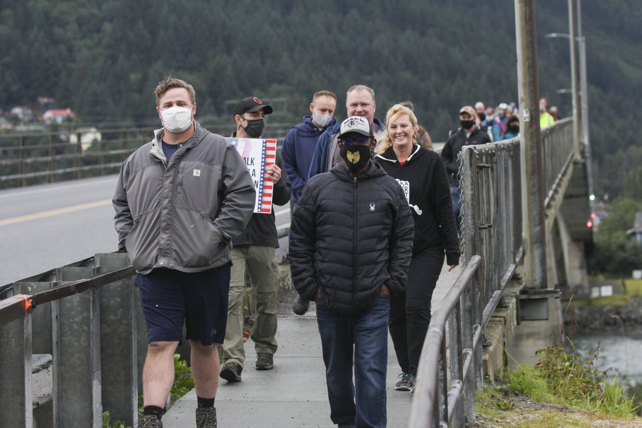 Juneau residents and veterans gathered on Tuesday, Aug. 24, 2021 for Together with Juneau Veterans first Walk with a Vet event across the Douglas Bridge. (Michael S. Lockett / Juneau Empire)