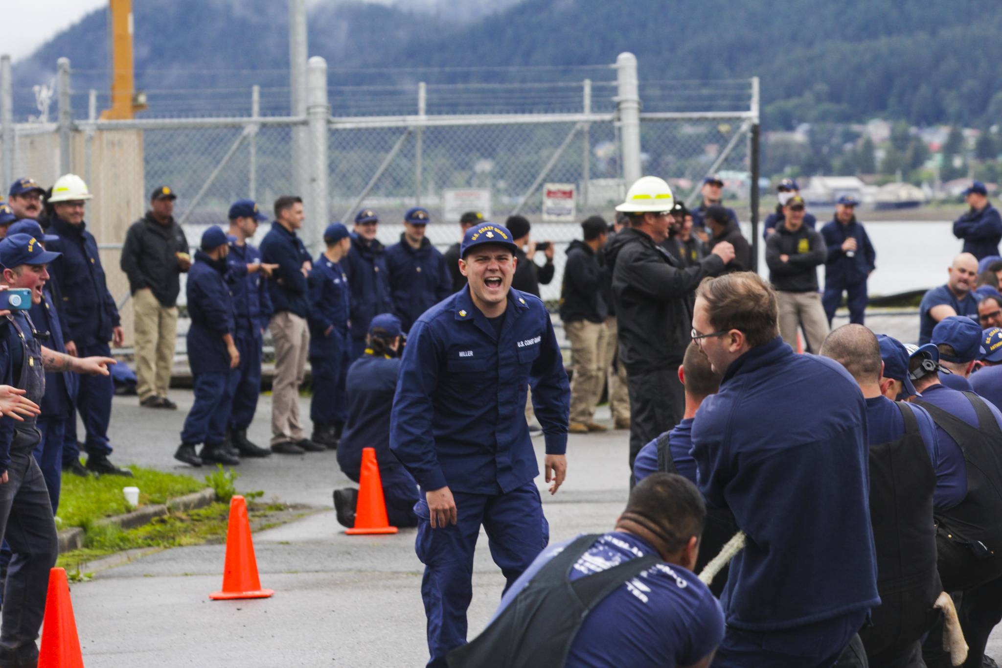 A petty officer exhorts his shipmates during the tug of war, one of the inter-vessel competitions during this year’s Buoy Tender Roundup at Sector Juneau, on Wednesday, Aug. 25, 2021. (Michael S. Lockett / Juneau Empire)