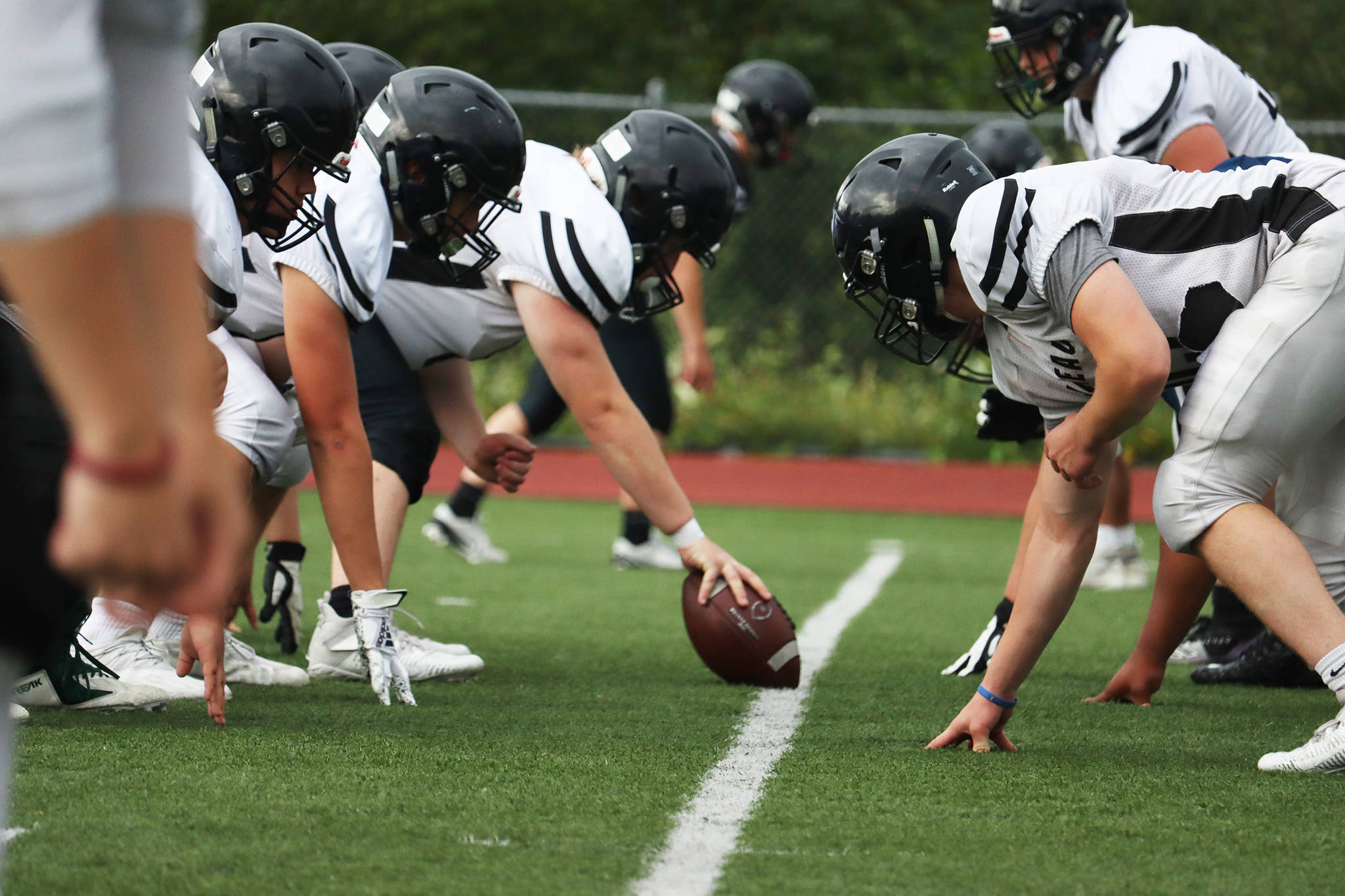 The Juneau Huskies practice on Aug. 10. The high school football team’s record stands at 2-1 following a loss to West Anchorage over the weekend. On Saturday, Juneau will host East Anchorage. (Ben Hohenstatt / Juneau Empire File)