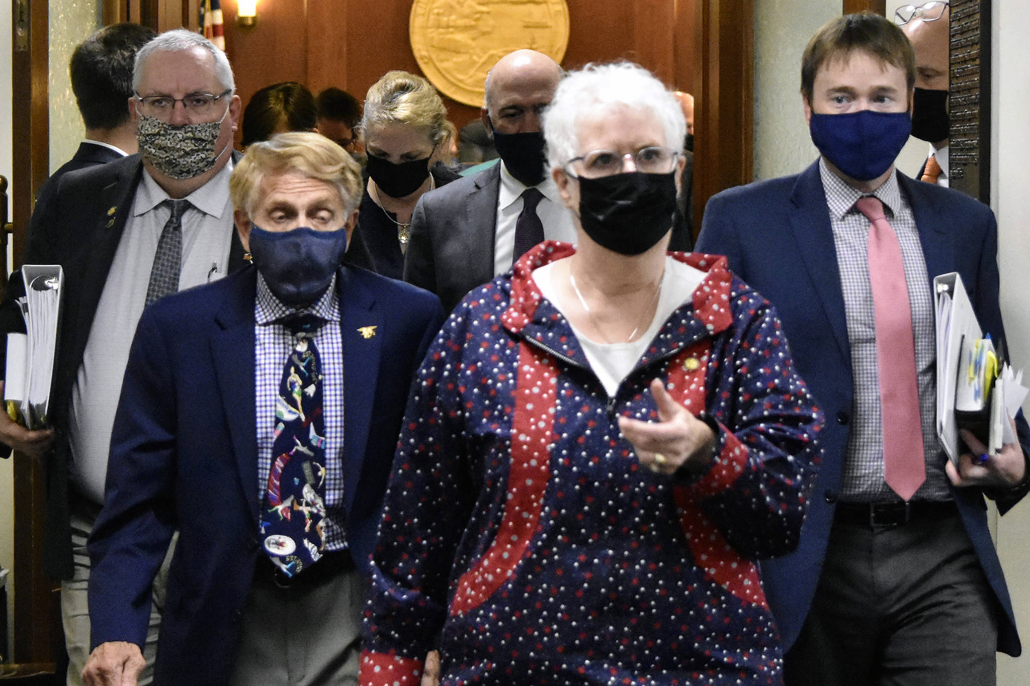 House Speaker Louise Stutes, R-Kodiak, center, leaves the House chambers on Tuesday, Aug. 31, 2021 following marathon floor sessions that morning and Monday night. The House passed an appropriations bill but not before members of the minority voiced deep objections. (Peter Segall / Juneau Empire)