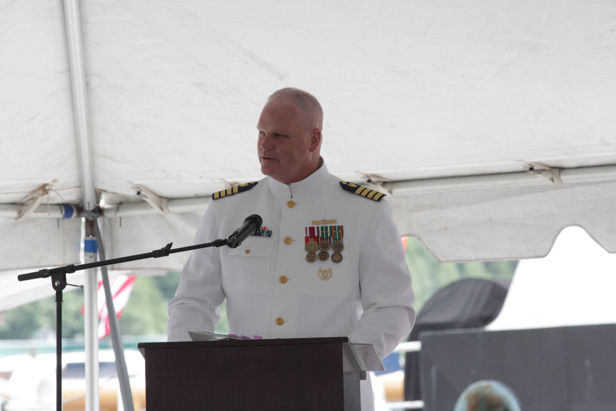 Capt. Darwin R. Jensen, Sector Juneaus new commander, speaks during the change of command ceremony at the station on July 7, 2021. (Michael S. Lockett / Juneau Empire)