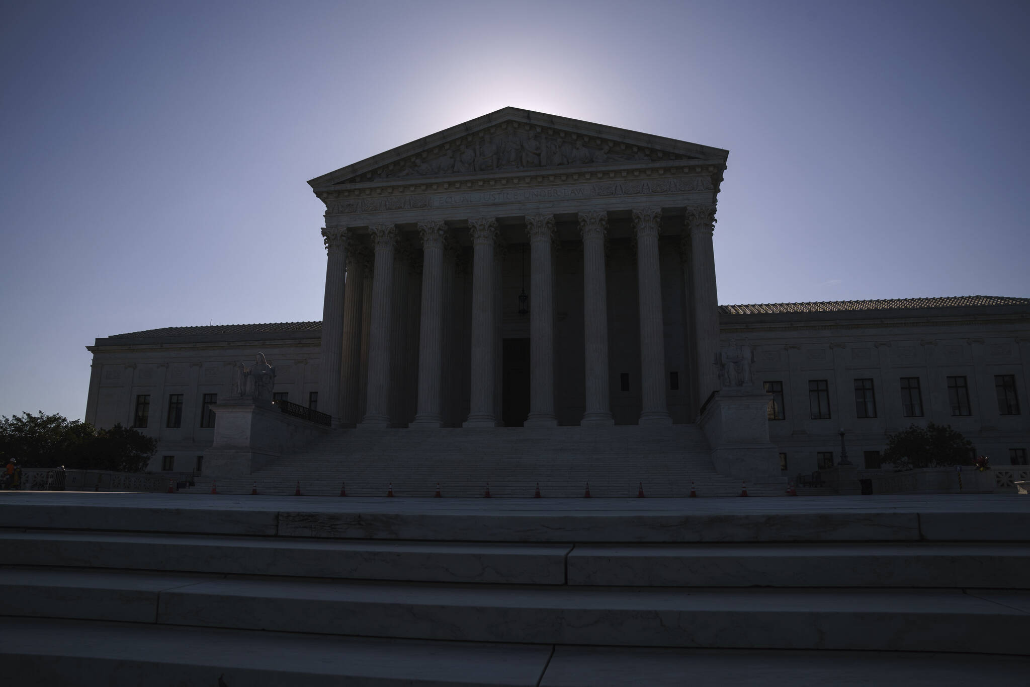 This photo shows the U.S. Supreme Court on Capitol Hill in Washington. Traditionally, the process of getting an opinion from the U.S. Supreme Court takes months and those rulings are often narrowly tailored. Emergency orders, especially during the court’s summer break, revolve around specific issues, like individual death penalty cases. But that pattern has changed in recent years with decisions coming outside the court’s normal procedures. (AP Photo / J. Scott Applewhite)
