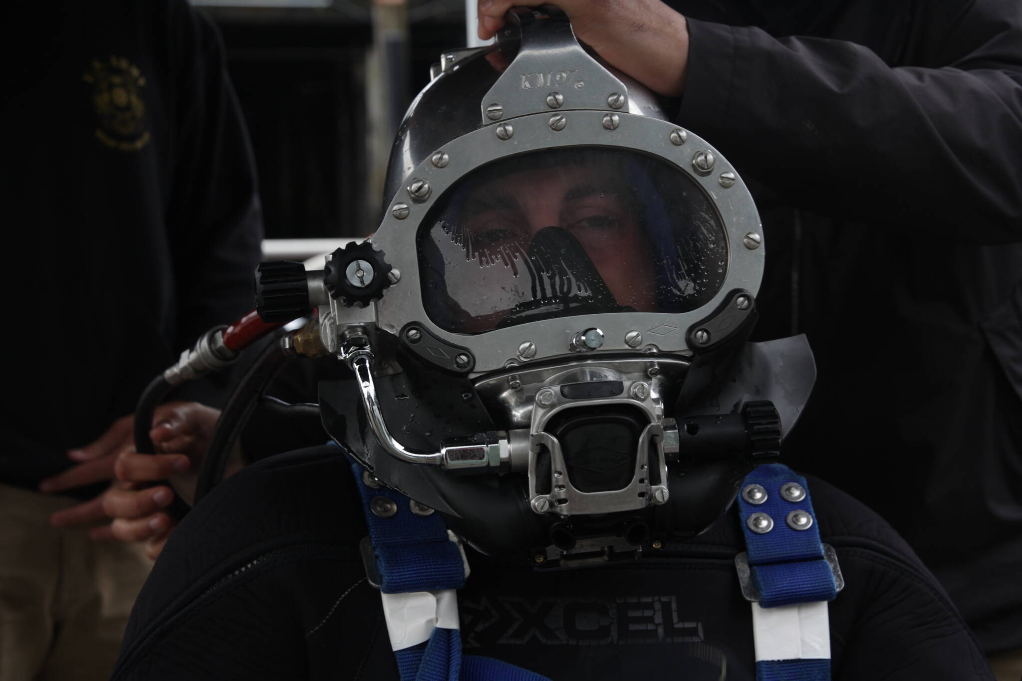Army Pfc. Luke McCarty prepares to dive in downtown Juneau as part of training for the engineer divers with a Coast Guard dive team on Sept. 6, 2021. (Courtesy photo / MyKenzie Robertson)
