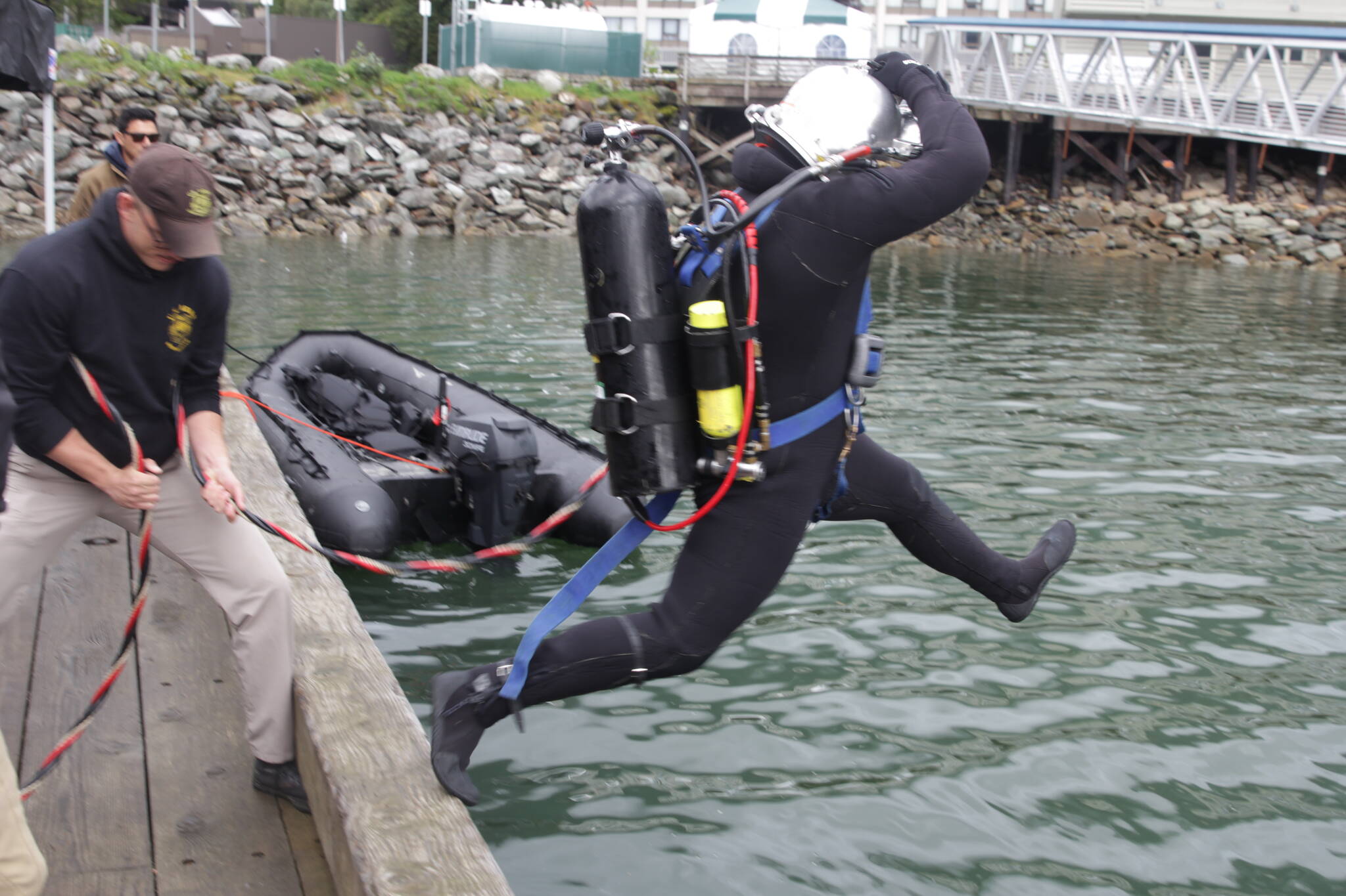 Army Pfc. Luke McCarty jumps in the water during training for the engineer divers with a Coast Guard dive team on Sept. 6, 2021. (Courtesy photo / MyKenzie Robertson)