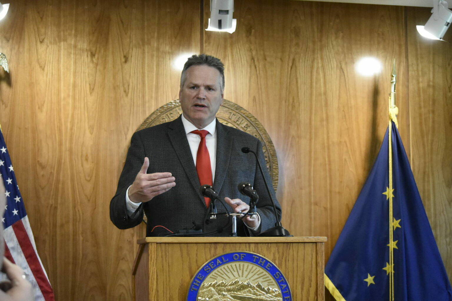 This photo shows Gov. Mike Dunleavy speaking at a July 2021 news conference.In a statement on Tuesday, Dunleavy said he would not veto the $1,100 Permanent Fund dividend passed by the Legislature. (Peter Segall / Juneau Empire File)