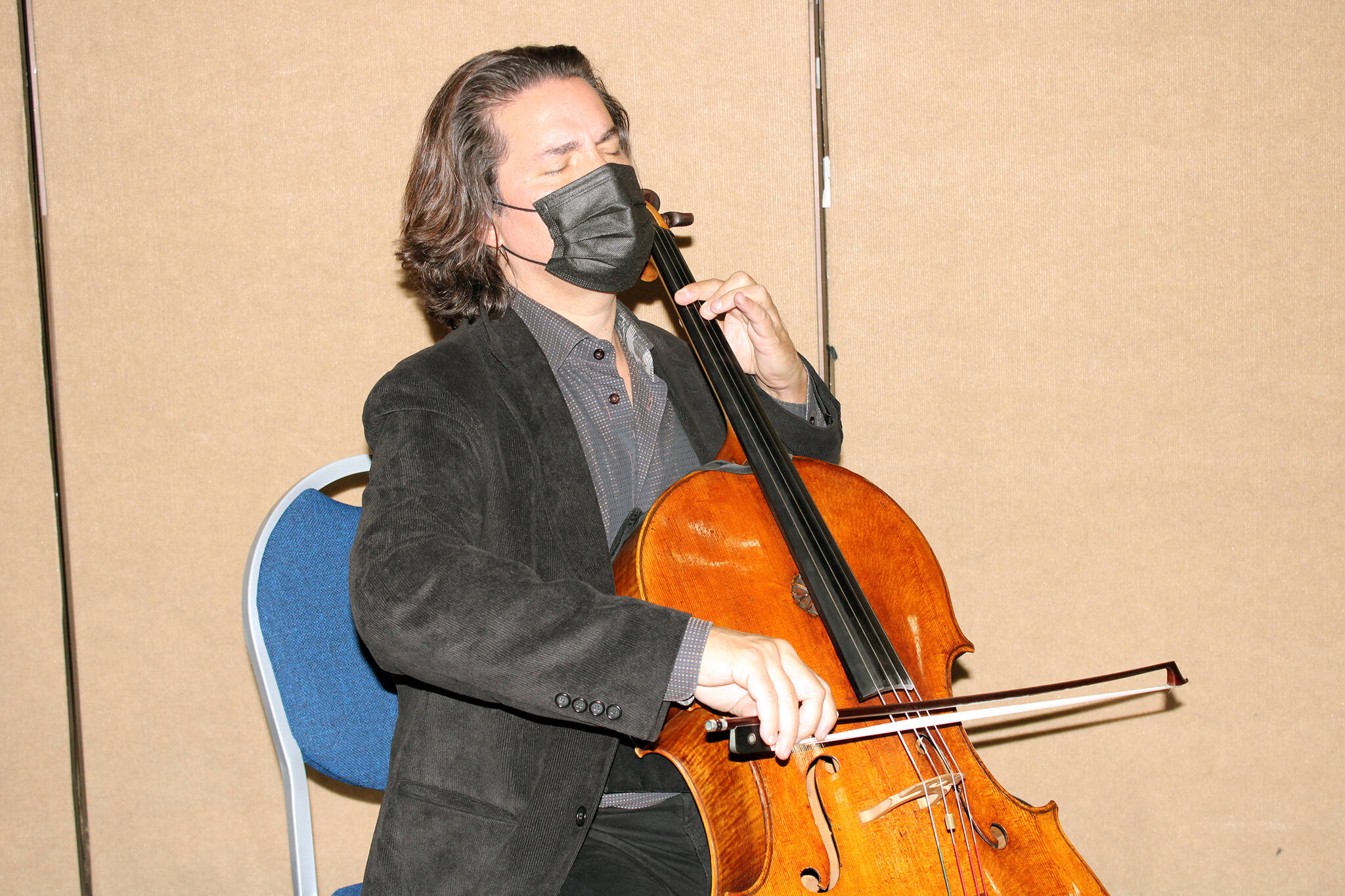 Grammy-award-winning cellist Zuill Bailey performed all six Bach suites as people filed in for a second COVID-19 vaccine dose at Centennial Hall on April 3. He will return to Juneau later this month as part of the Fall Festival sponsored by Juneau Jazz & Classics. The live, in-person event will take place Sept. 29 through Oct. 2, at the Juneau Arts & Culture Center. (Dana Zigmund / Juneau Empire File)