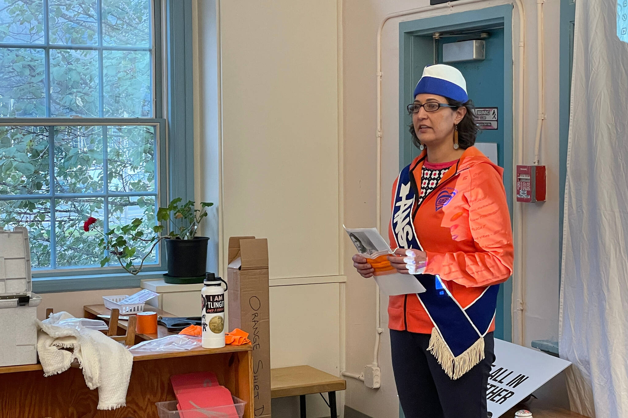 Jamiann Hasselquist, vice president of Alaska Native Sisterhood Camp 2, speaks to an invited crowd at the Juneau Montessori School about Orange Shirt Day, a day of remembrance for the victims of residential school systems for Indigenous people in Canada and the United States on Sept. 28, 2021. (Michael S. Lockett / Juneau Empire)