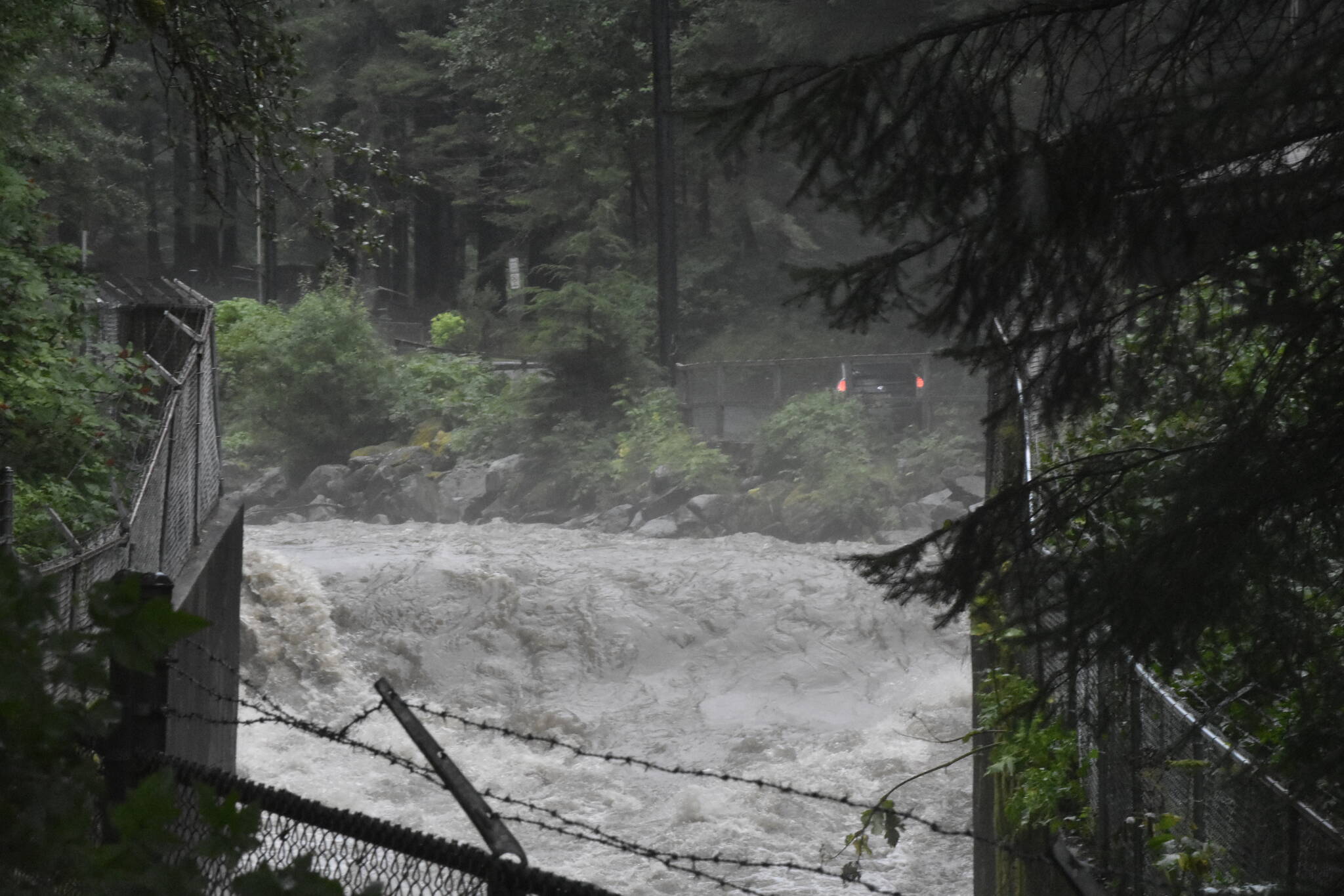 Water rushes down Gold Creek on Aug. 13, 2021. Juneau residents can expect heavy rain and strong winds beginning Friday. Forecasters expect the strongest winds late Friday night. (Peter Segall/Juneau Empire)