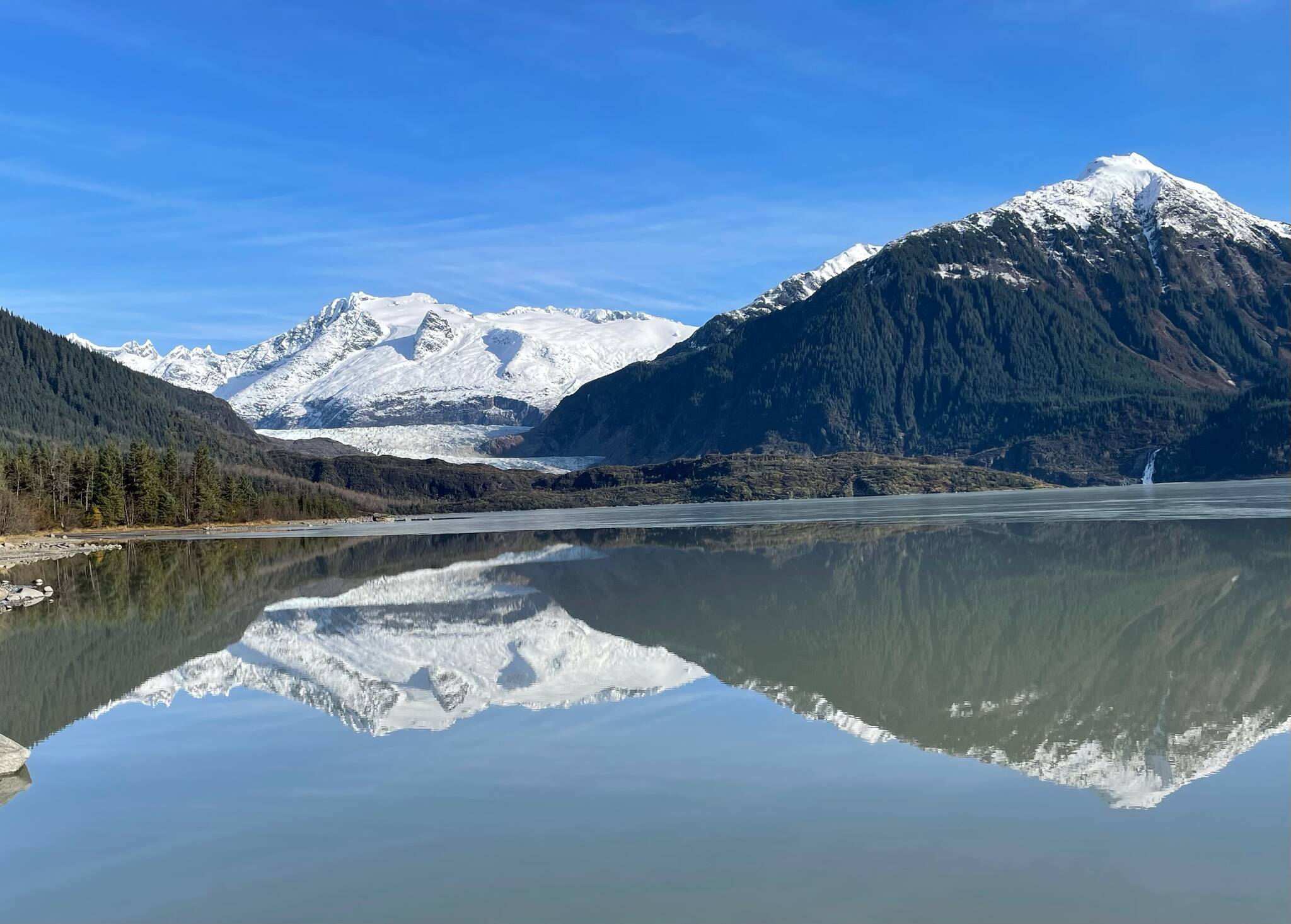 The Mendenhall Towers and Bullard Mountain are reflected in Mendenhall Lake on Oct. 17. (Courtesy Photo / Scott Novak)