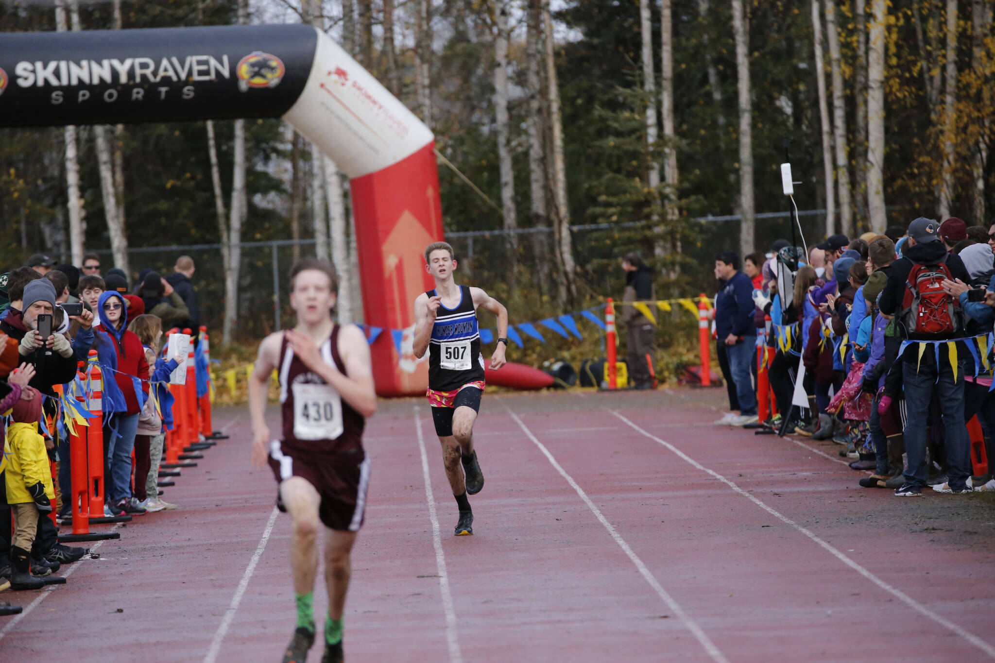 Thunder Mountain High School’s Darin Tingey sprints for the finish during the Alaska School Activities Association’s 2021 state cross country championships, hosted in Anchorage, on Oct. 9, 2021. (Courtesy photo / Eric Hanson)