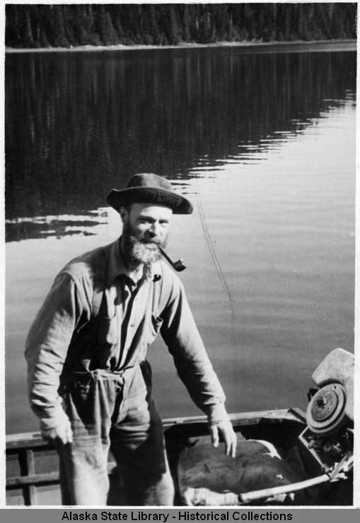 Allen Hasselborg in a skiff in 1932. (Alaska State Library Historical Collections)