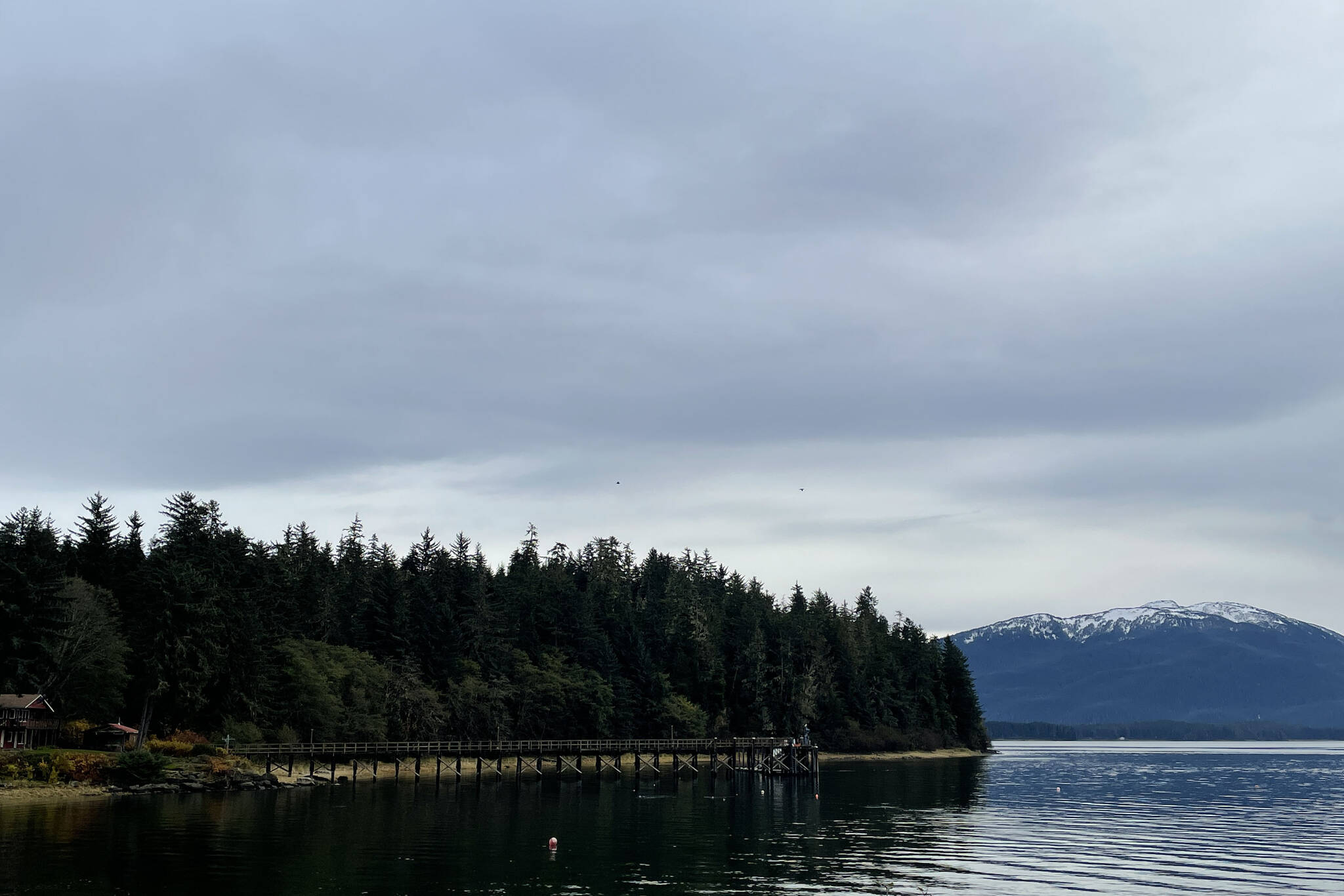 A body was found in the water near the Indian Cove dock on Sunday morning, Oct. 17, 2021 after a call to emergency services that she hadn’t returned from a walk. (Michael S. Lockett / Juneau Empire)