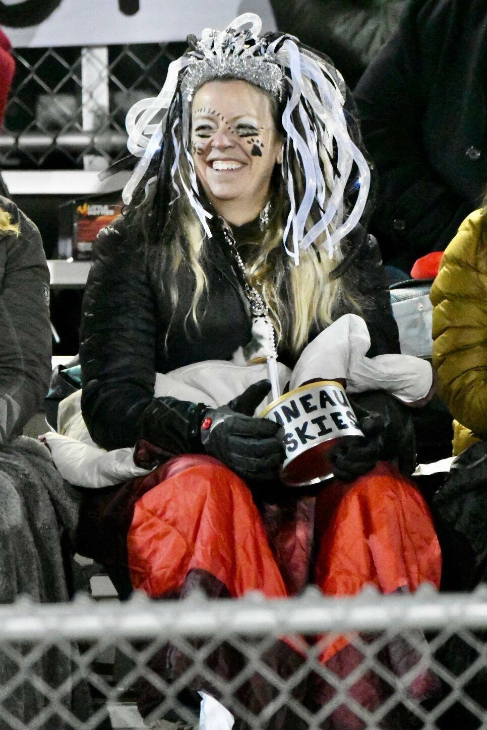 Judy Campbell, mother of Huskies lineman Brandon Campbell, smiles in the stands. The Juneau faithful who traveled to Anchorage were boisterous throughout the 2021 Alaska School Activities Association First National Bowl Series Division I game. (Courtesy Photo / Larry Schrader)
