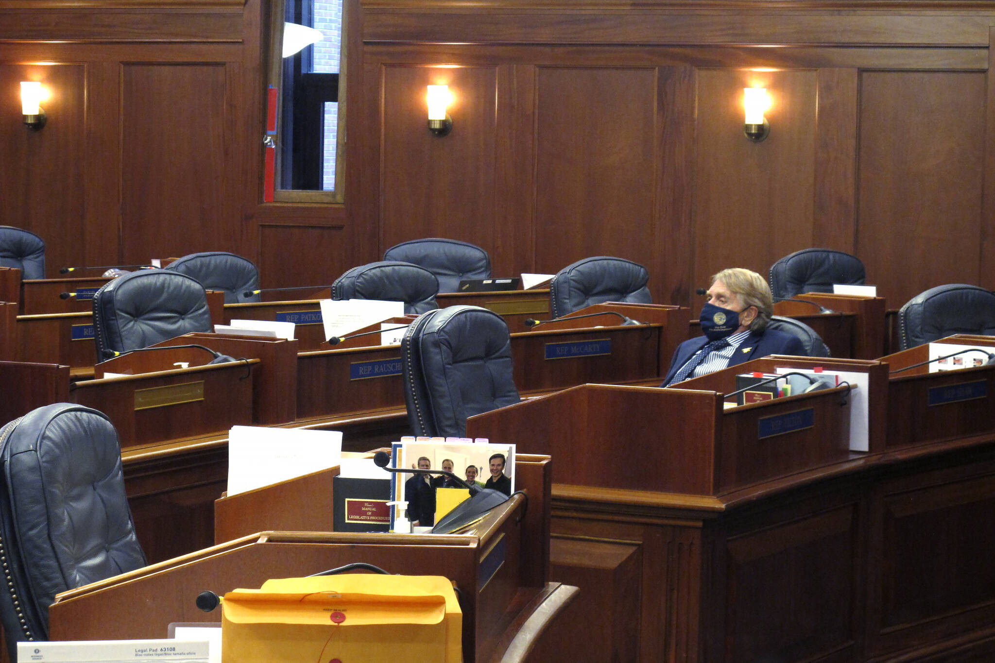 Alaska state Rep. Laddie Shaw, an Anchorage Republican, waits for the start of a so-called technical session on the House floor, Wednesday, Oct. 20, 2021, in Juneau, Alaska. The fourth special legislative session of the year began Oct. 4, in Juneau, but there has been little action at the Capitol and little progress toward resolving Alaska’s fiscal issues. (AP Photo / Becky Bohrer)
