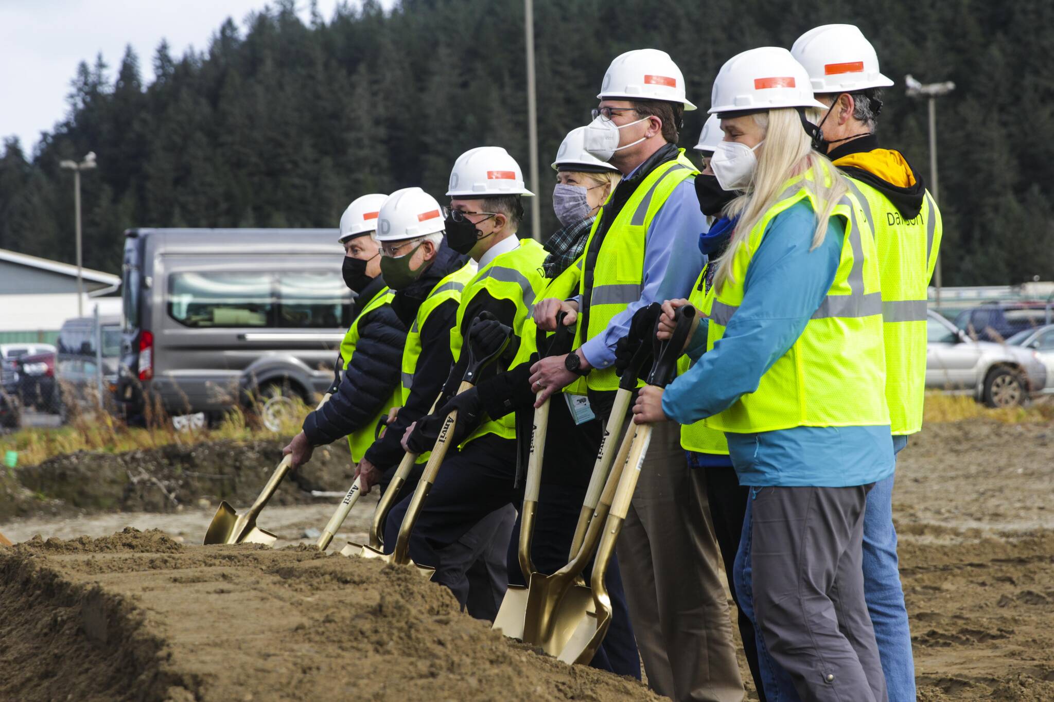 Local officials and dignitaries prepare to ceremonially break ground on the Teal Street Center, a multi-tenant building housing a number of nonprofit and tribal services for Southeast residents next to the Glory Hall on Nov. 2, 2021. (Michael S. Lockett / Juneau Empire)