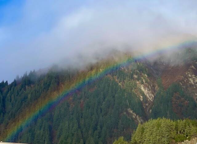 As clouds dissipate, a rainbow appears along the side of Mount Juneau on Nov. 6. (Courtesy Photo / Denise Carroll)