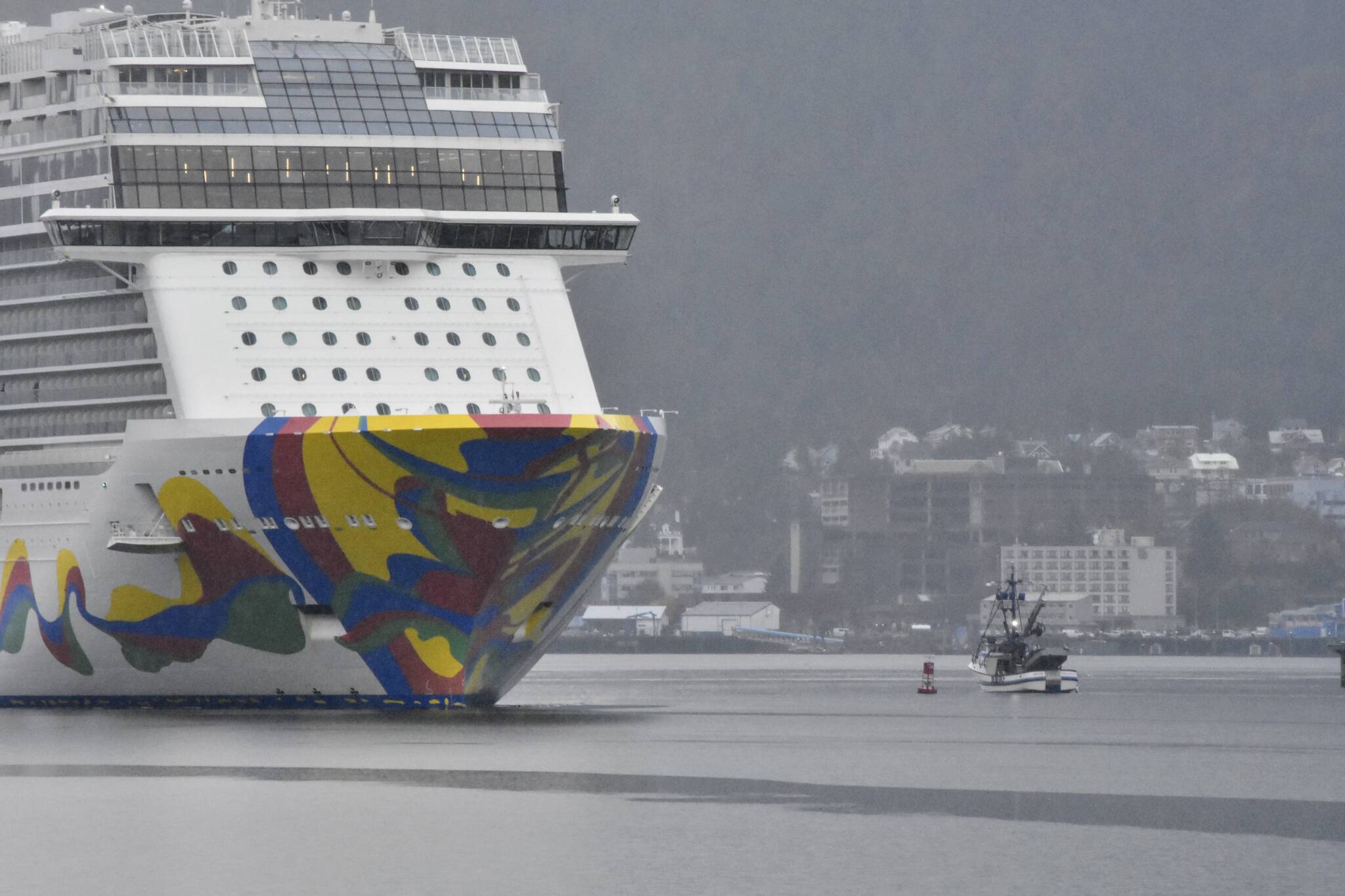 Peter Segall / Juneau Empire 
The last cruise ship of the year, the Norwegian Encore, sails out of Juneau on Wednesday, Oct., 20, 2021, ending a cruise ship season that almost didn’t happen. Despite a smaller season this year, local officials expect a robust season in 2022.