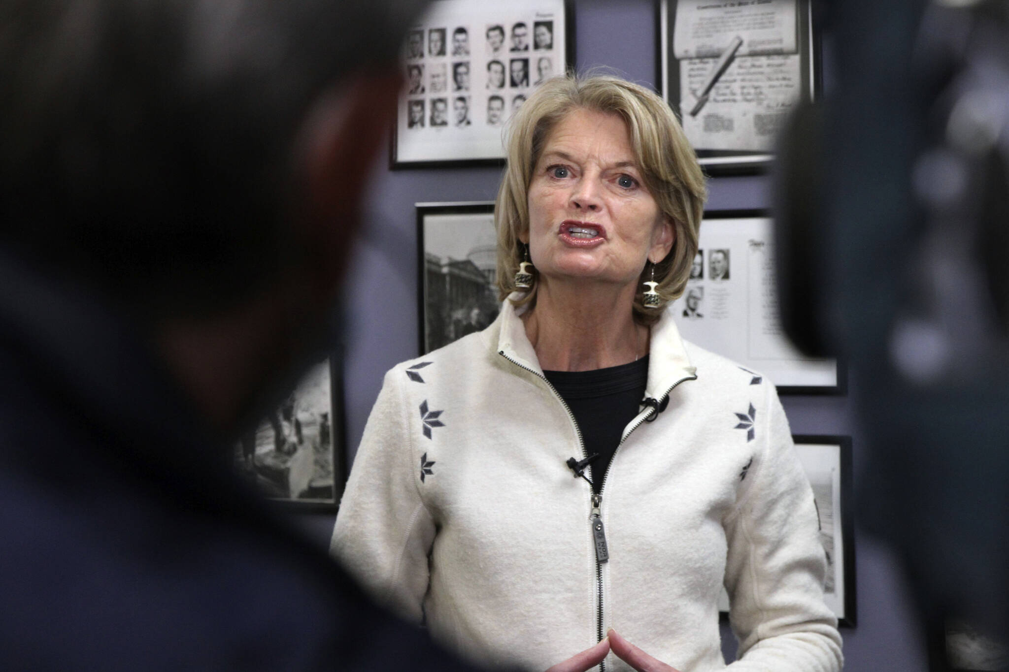 U.S. Sen. Lisa Murkowski, an Alaska Republican, speaks to reporters after filing for re-election Friday, Nov. 12, 2021, at the Division of Elections office in Anchorage, Alaska, setting up a race against a primary challenger endorsed by former President Donald Trump. (AP Photo/Mark Thiessen)