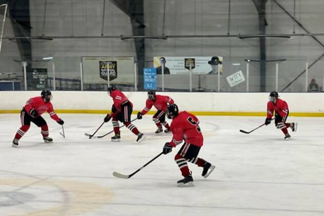 The Juneau-Douglas High School: Yadaa.at Kalé hockey team was in Palmer on Nov. 13, 2021, for a series of games in the Matanuska-Susitna Valley. Coach Luke Adams told the Empire he was confident in his team who were eager for the season ahead. (Courtesy photo / Judy Campbell)