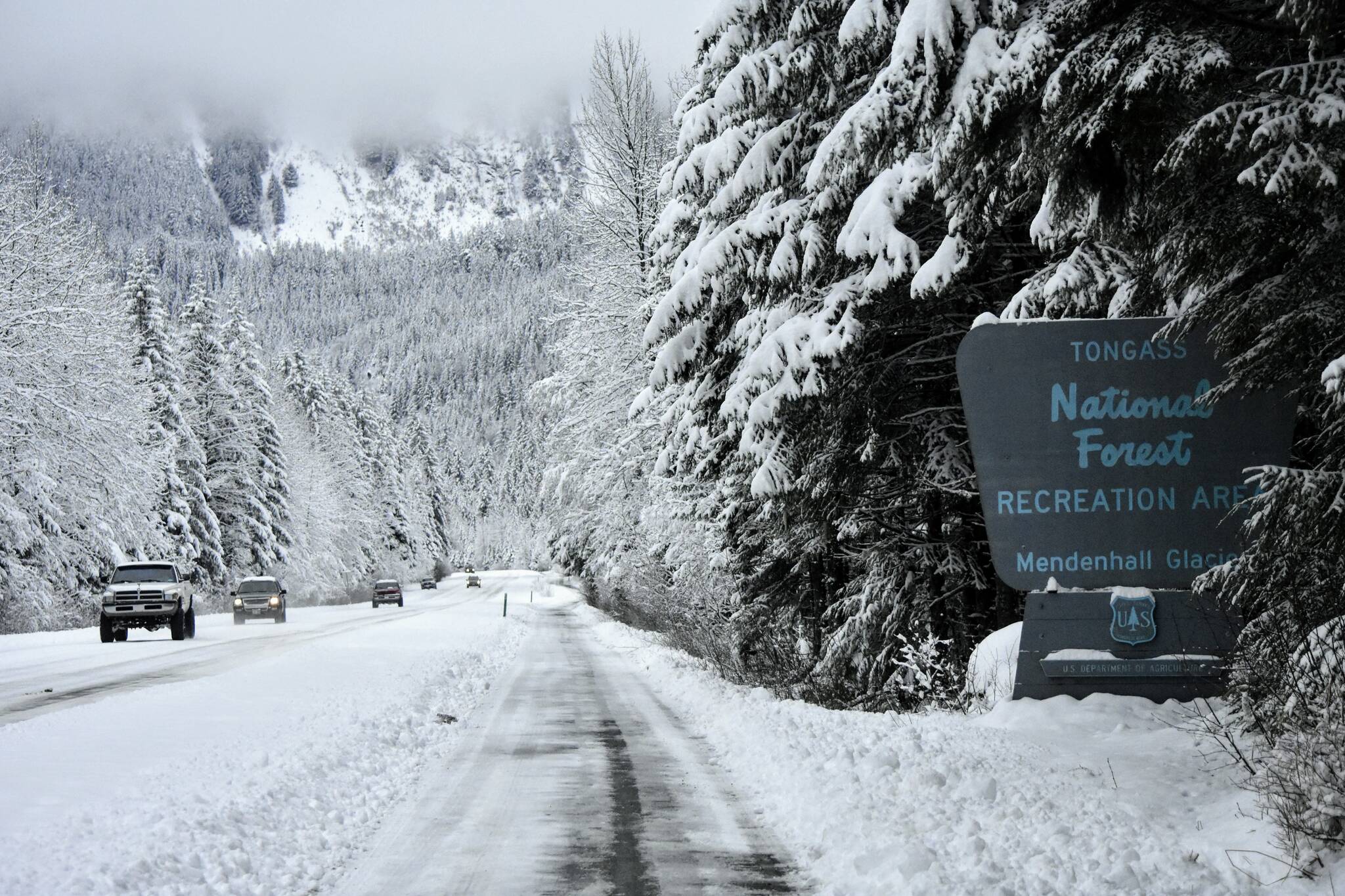The entrance to the Mendenhall Glacier Recreation Area in the Tongass National Forest was covered in snow on Friday, Nov. 19, 2021, a day after federal authorities announced the next step in restoring the 2001 Roadless Rule on the forest. (Peter Segall / Juneau Empire)