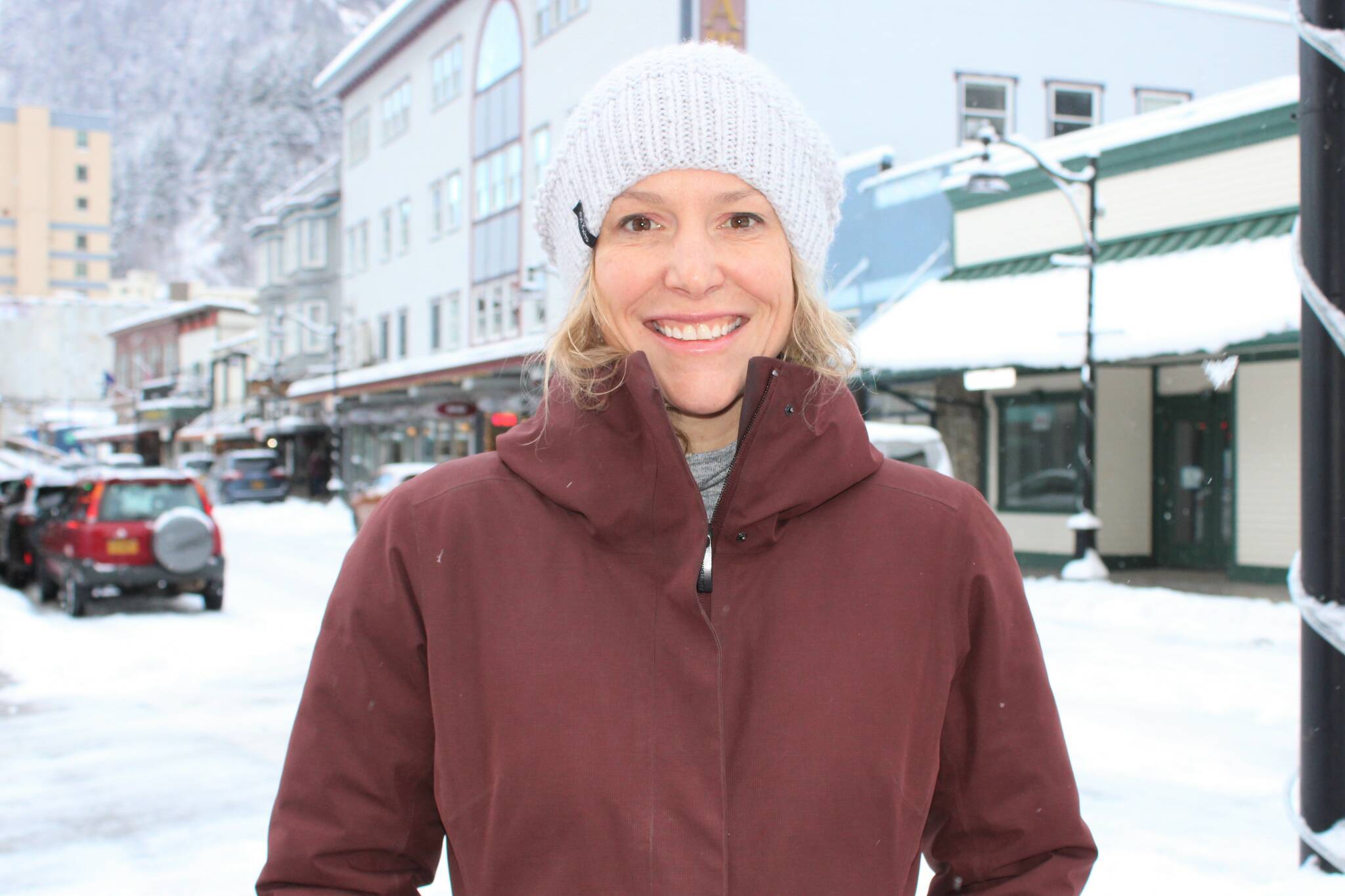 Alexandra Pierce, the newly named City and Borough of Juneau Tourism Manager, stands on South Franklin Street on Dec. 3. (Dana Zigmund/Juneau Empire)