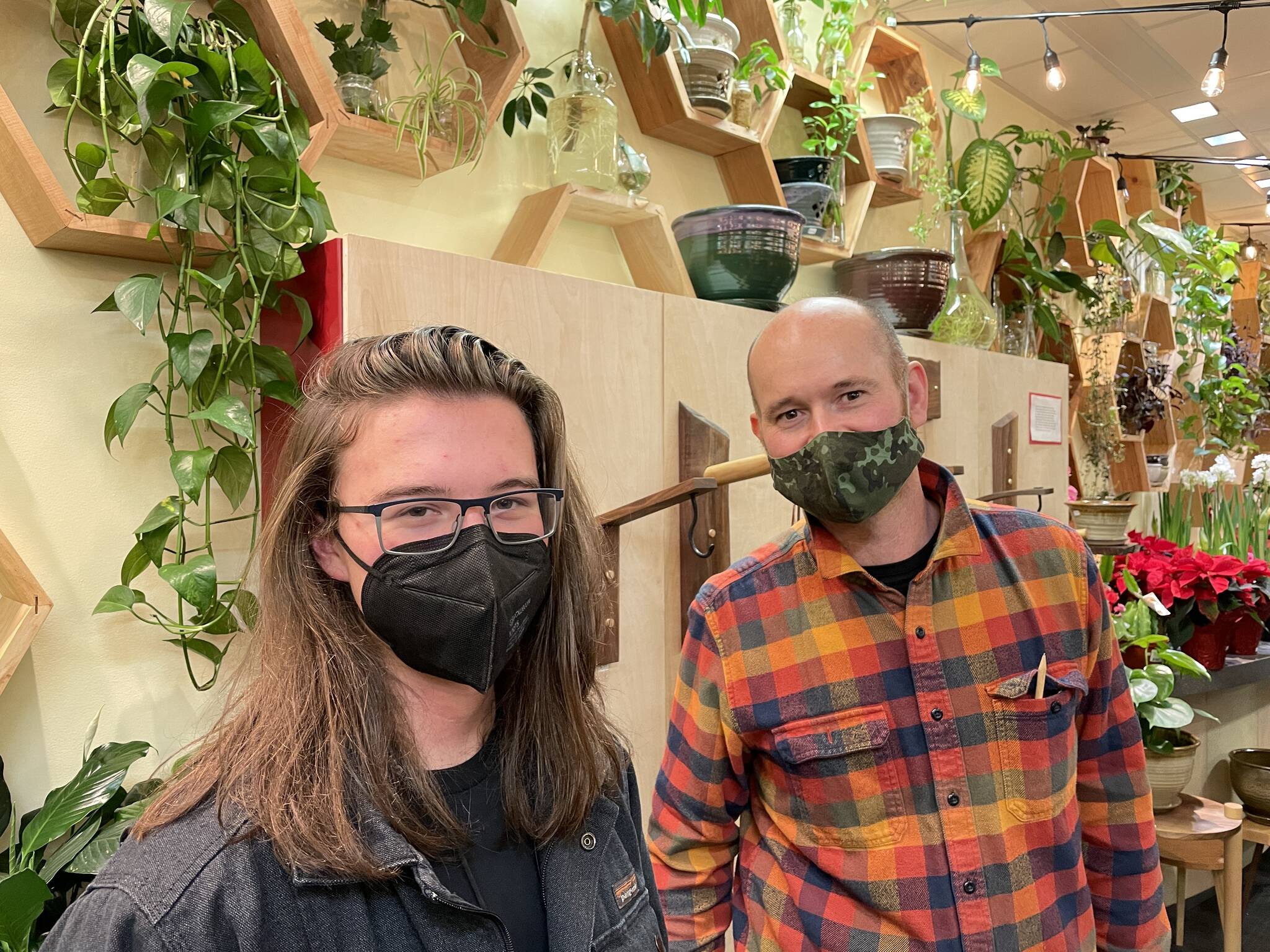 Liam Penn, left, and Henry Webb, right, were featured at the Plant Studio during Gallery Walk on Dec. 3, 2021. (Michael S. Lockett / Juneau Empire)