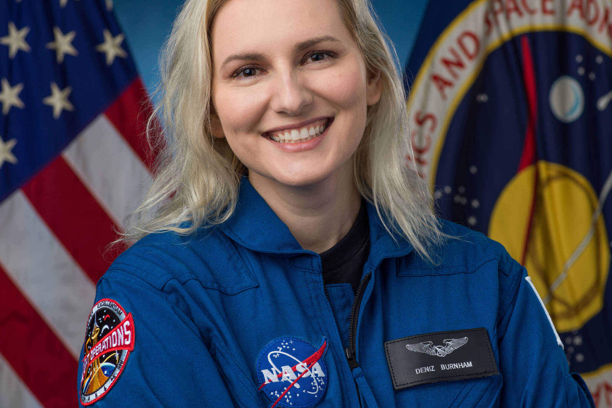 Astronaut Candidate Deniz Burnham, of ASCAN Class of 2021, poses for an official photo on Dec. 3, 2021. (Robert Markowitz / NASA)