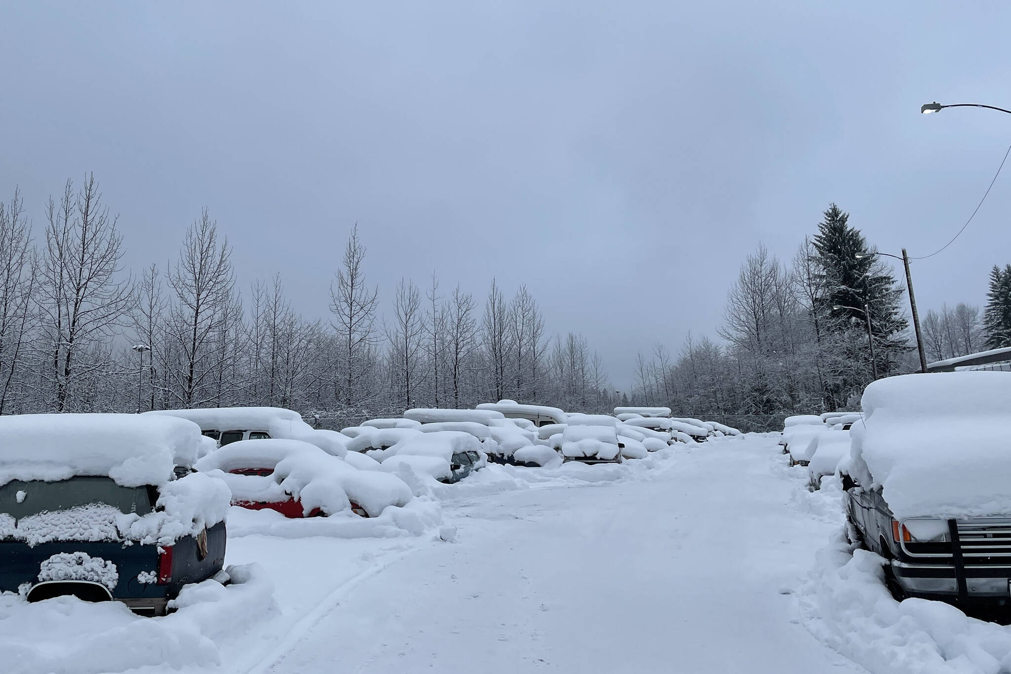 Michael S. Lockett / Juneau Empire
This photo shows vehicles at the city impound lot in Lemon Creek on Dec. 9, 2021. Space is perpetually at a premium in the impound lot, which holds vehicles for all sorts of reasons.
