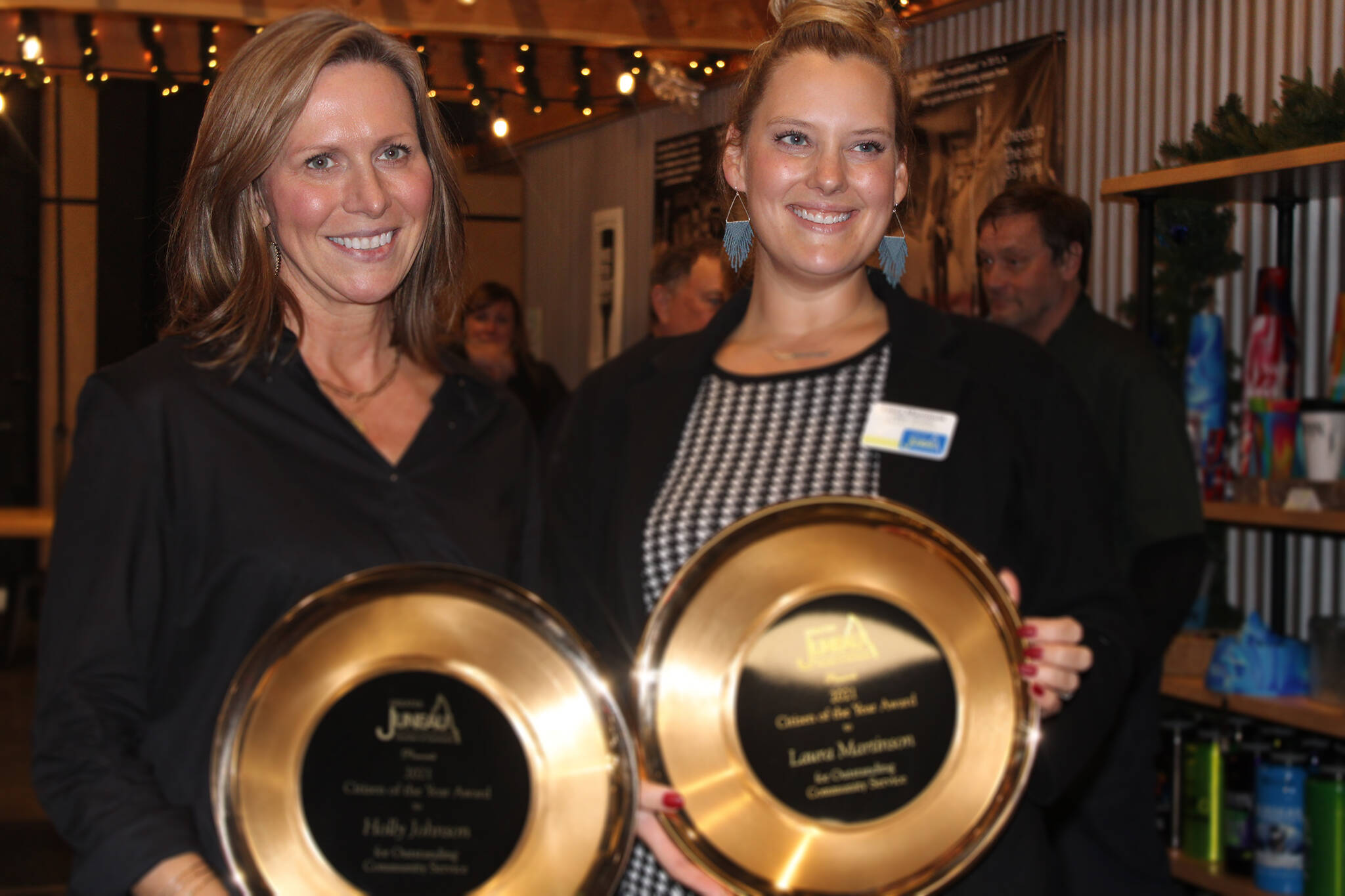 Holly Johnson, left, and Laura Martinson were named Juneau’s Citizens of the year on Thursday night. Martinson, who owns Caribou Crossings, and Johnson, president of Wings Airways, received the award in recognition of their leadership of the Protect Juneau’s Future committee. (Dana Zigmund/Juneau Empire)