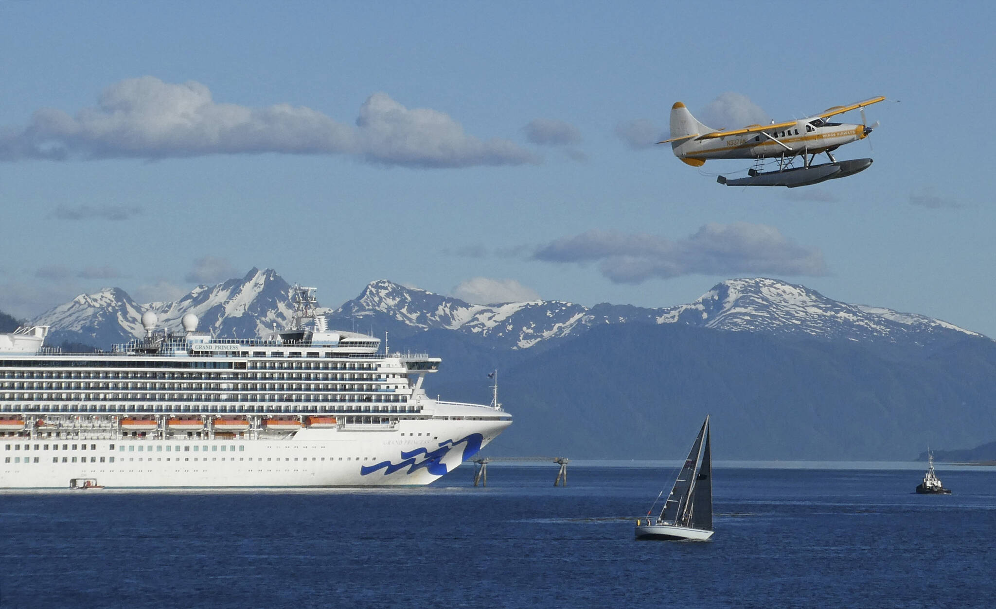 A float plane takes off over Gastineau Channel in Juneau, Alaska., on May 30, 2018. Alaska Gov. Mike Dunleavy said on Monday, Dec. 13, 2021, that he will propose a $5 million grant in his upcoming budget to support tourism marketing efforts amid the ongoing pandemic. (AP Photo / Becky Bohrer)