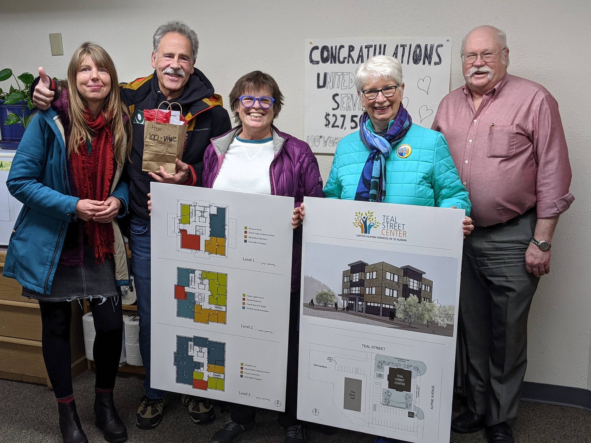 Representatives from Juneau’s 100+ Women Who Care present donations to support Teal Street Center. Pictured are Julie Nielsen, 100WWC; Joe Parrish, UHS President; Marla Berg,100WWC; Sioux Douglas, Teal Street Center Campaign Chair; Wayne Stevens, UHS Board member & United Way of SE Alaska President.