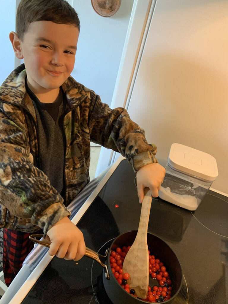 Ryker Goddard makes Alaskan berry compote to spread on his toast. (Courtesy Photo / Mary Goddard)