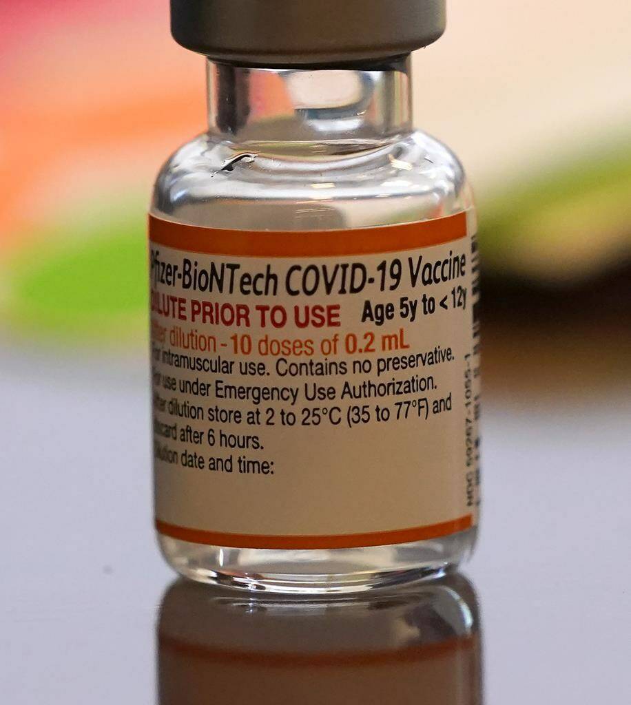 A vial of the Pfizer-BioNTech COVID-19 vaccine for children 5 to 12 years old sits ready for use at a vaccination site in Fort Worth, Texas, Thursday, Nov. 11, 2021. THE CANADIAN PRESS/AP-LM Otero