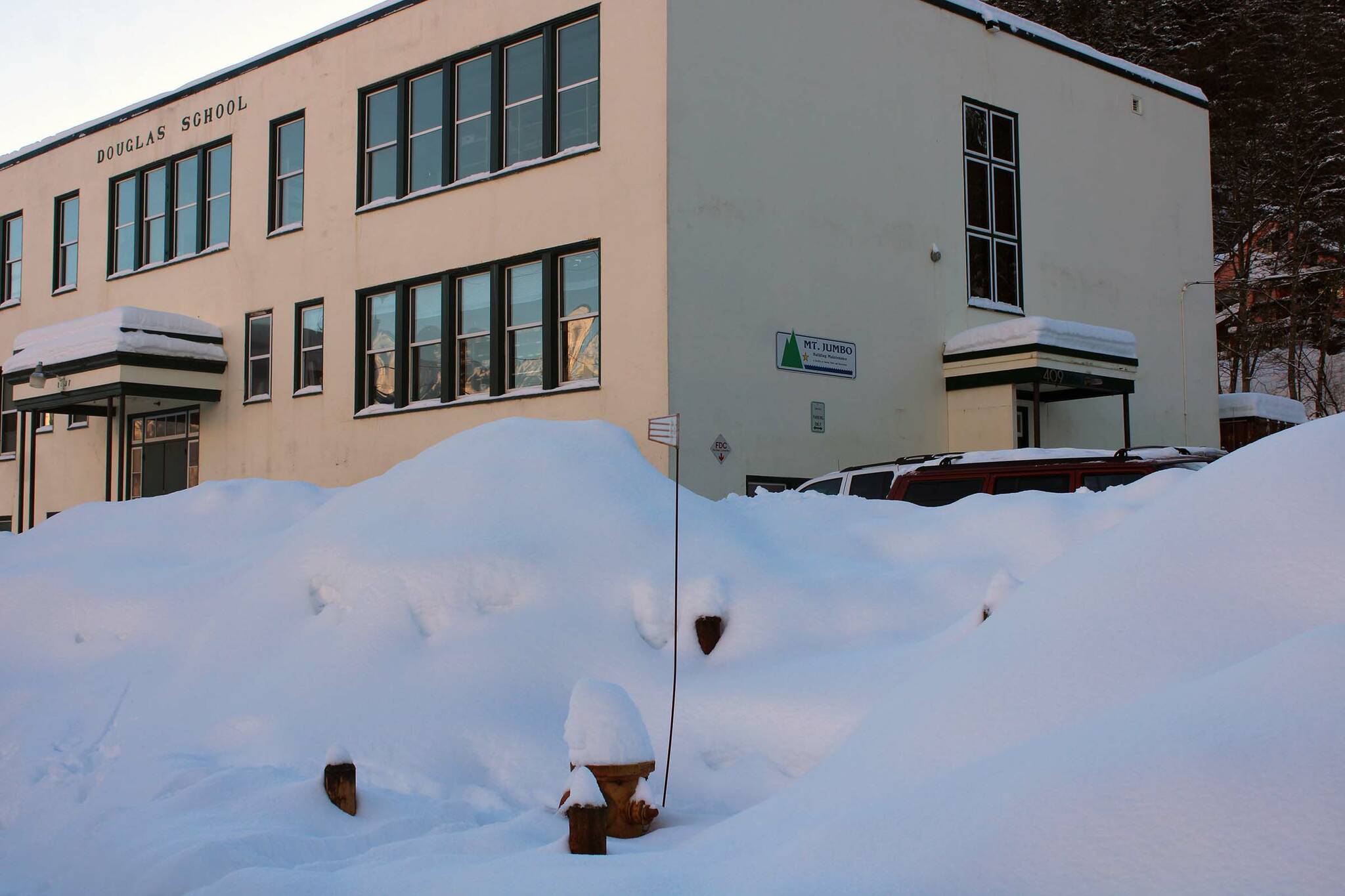 Snow piles up outside the Mt Jumbo gym building in Douglas on Dec. 28. (Dana Zigmund/Juneau Empire)