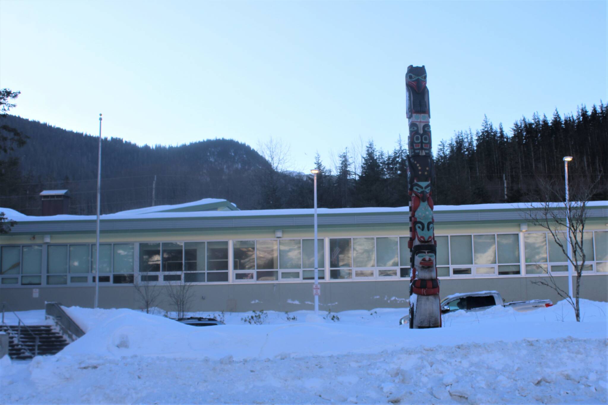 Sayéik: Gastineau Community School stands against a snowy backdrop on Jan. 4. Students in the Juneau School District are set to return to class on Monday. Despite rising COVID-19 cases across the City and Borough of Juneau, school officials say schools will be open and ready to welcome students. (Dana Zigmund/Juneau Empire)