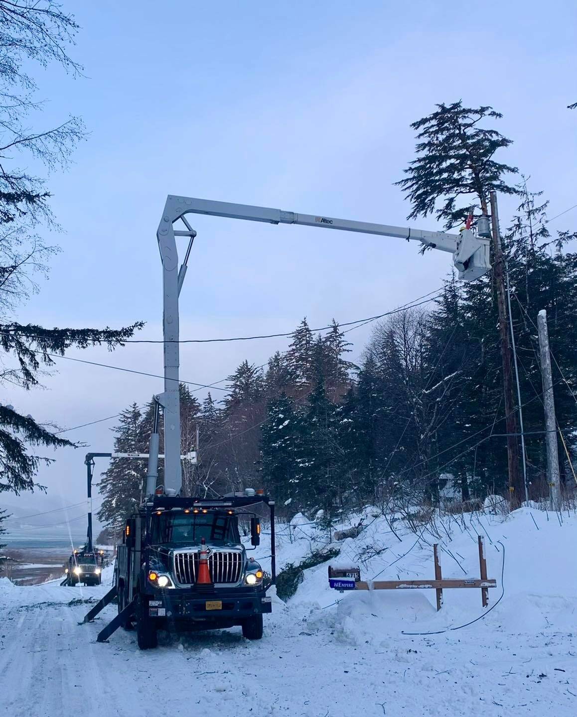 Line crews from Alaska Electric Light & Power work to restore power to Thane following an avalanche on Jan. 3, 2022. (Courtesy photo / Evan Bixby)