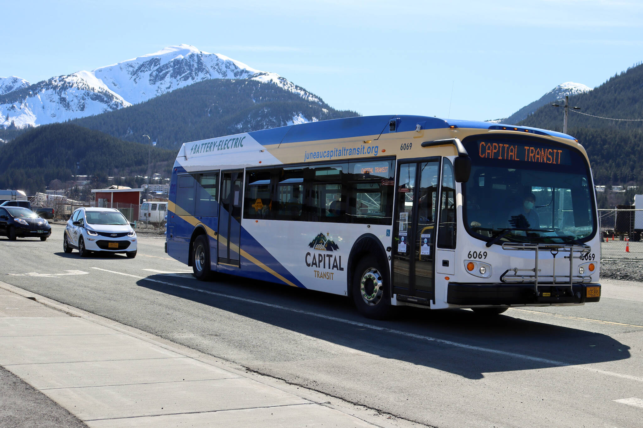 Capital Transit’s electric bus leads the charge at an Earth Day Electric Vehicle Road Rally. The bus has been plagued by mechanical maladies, but city officials remain committed to electrifying the city’s streets. (Ben Hohenstatt / Juneau Empire File)