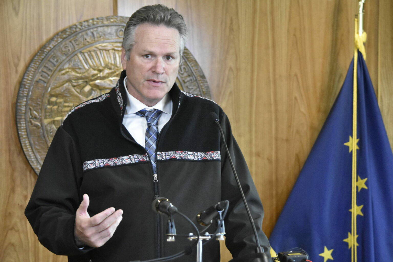 Gov. Mike Dunleavy speaks to a joint meeting of the Alaska State Legislature at the Alaska State Capitol on Tuesday, Jan. 25, 2022, for his fourth State of the State address of his administration. Dunleavy painted a positive picture for the state despite the challenges Alaska has faced during the COVID-19 pandemic and its effects on the economy. (Peter Segall / Juneau Empire)