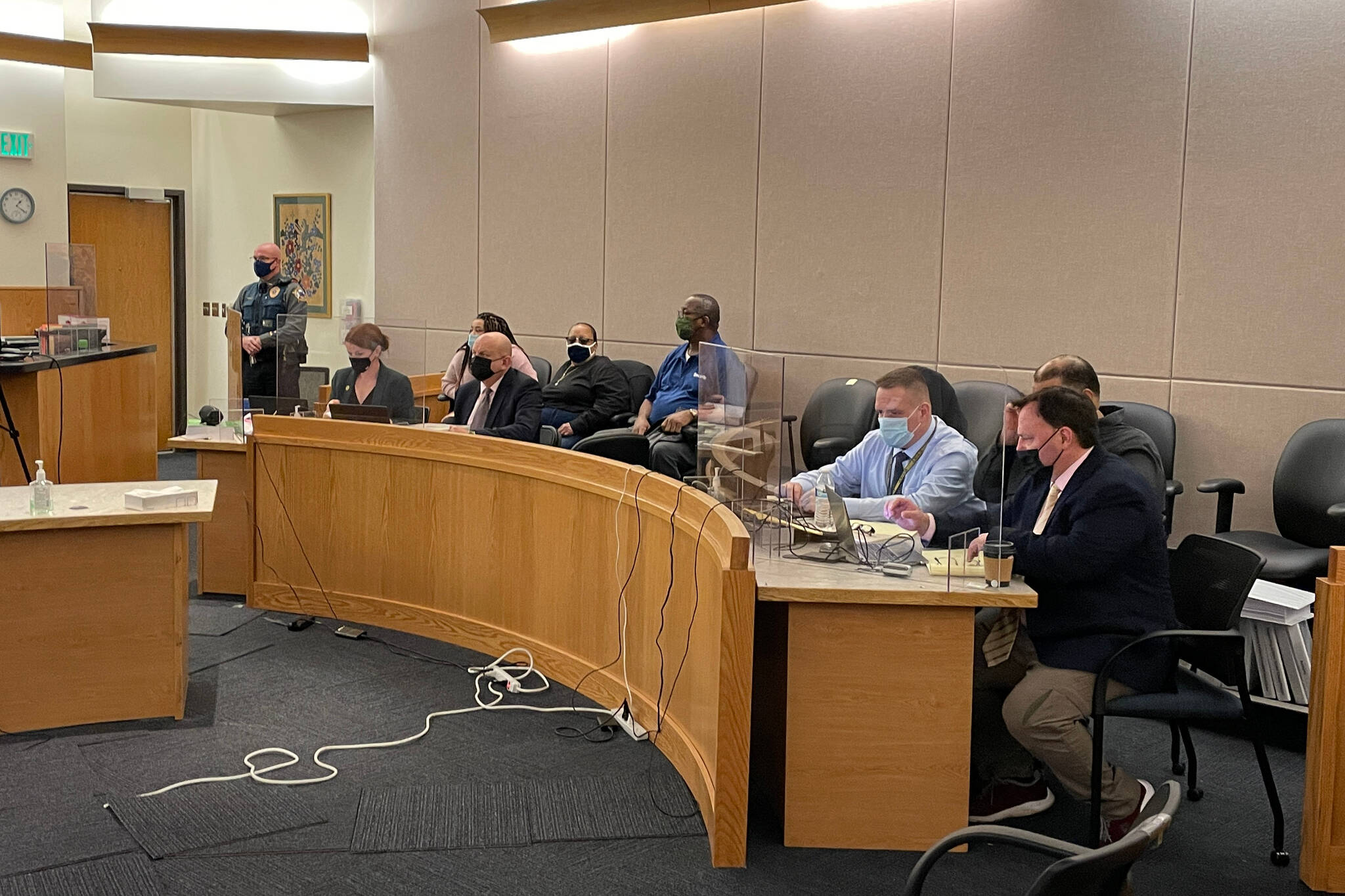 Members of the prosecution and defense, including defendant John Stapleton, sit during a trial for a 2018 killing on Jan. 13, 2022. (Michael S. Lockett / Juneau Empire File)