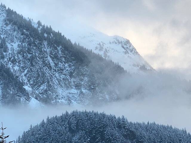 After a gray drizzly day, skies opening up on Mount Juneau are a welcome sight on Feb. 2. (Courtesy Photo / Denise Carroll)
