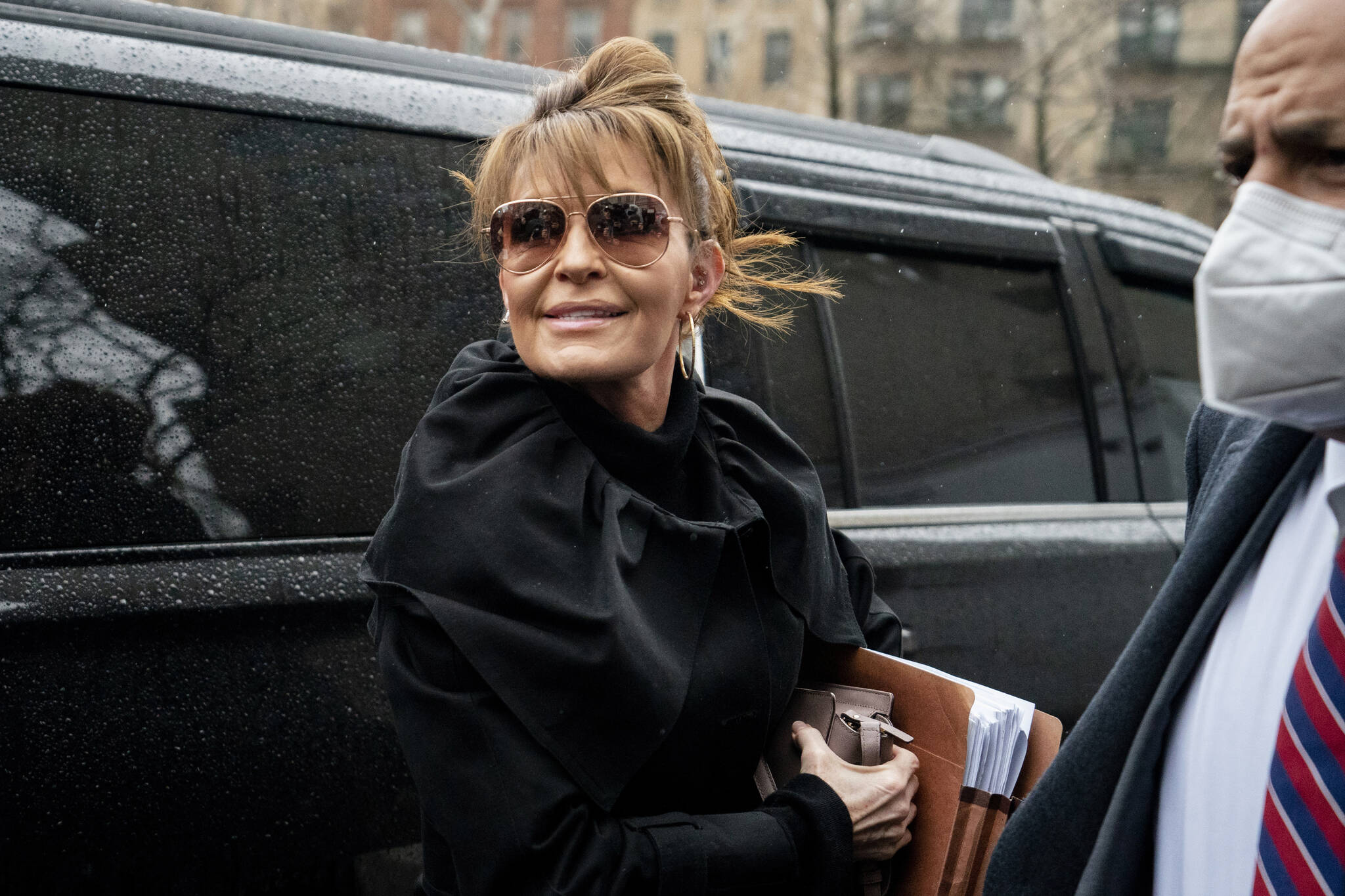 Former Alaska Gov. Sarah Palin arrives to Federal court, Thursday, Feb. 3, 2022, in New York. Palin is due back in a New York City courtroom more than a week after her libel trial against The New York Times was postponed because she tested positive for COVID-19. (AP Photo / John Minchillo)
