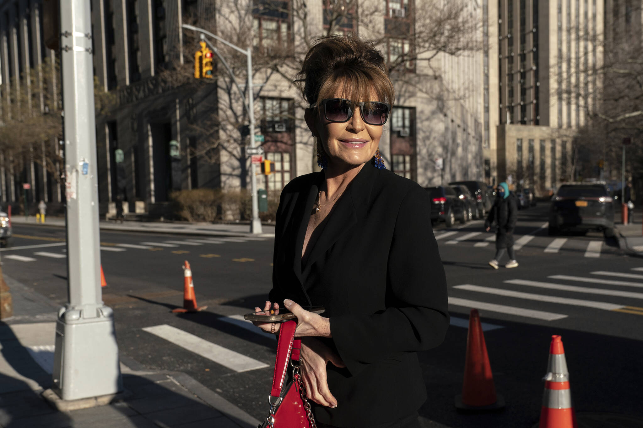 Former Alaska Gov. Sarah Palin arrives to Federal court in New York City on Friday, Feb. 11, 2022. Palin claims the New York Times damaged her reputation with an editorial linking her campaign rhetoric to a mass shooting. (AP Photo / Jeenah Moon)