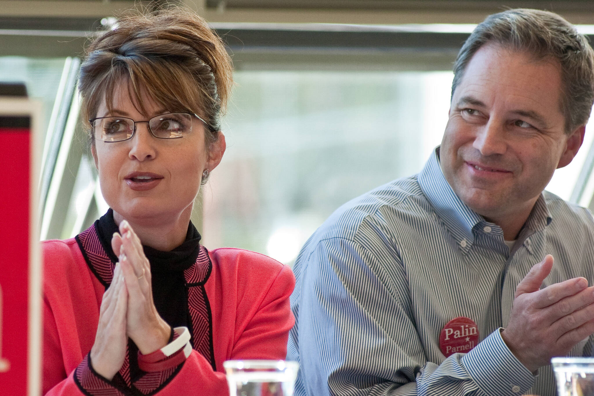 Canidate for Governor Sarah Palin and running mate Sean Parnell listen to introductions during a Capital City Republican Women's luncheon at the UAS Recreation Center in September 2006.