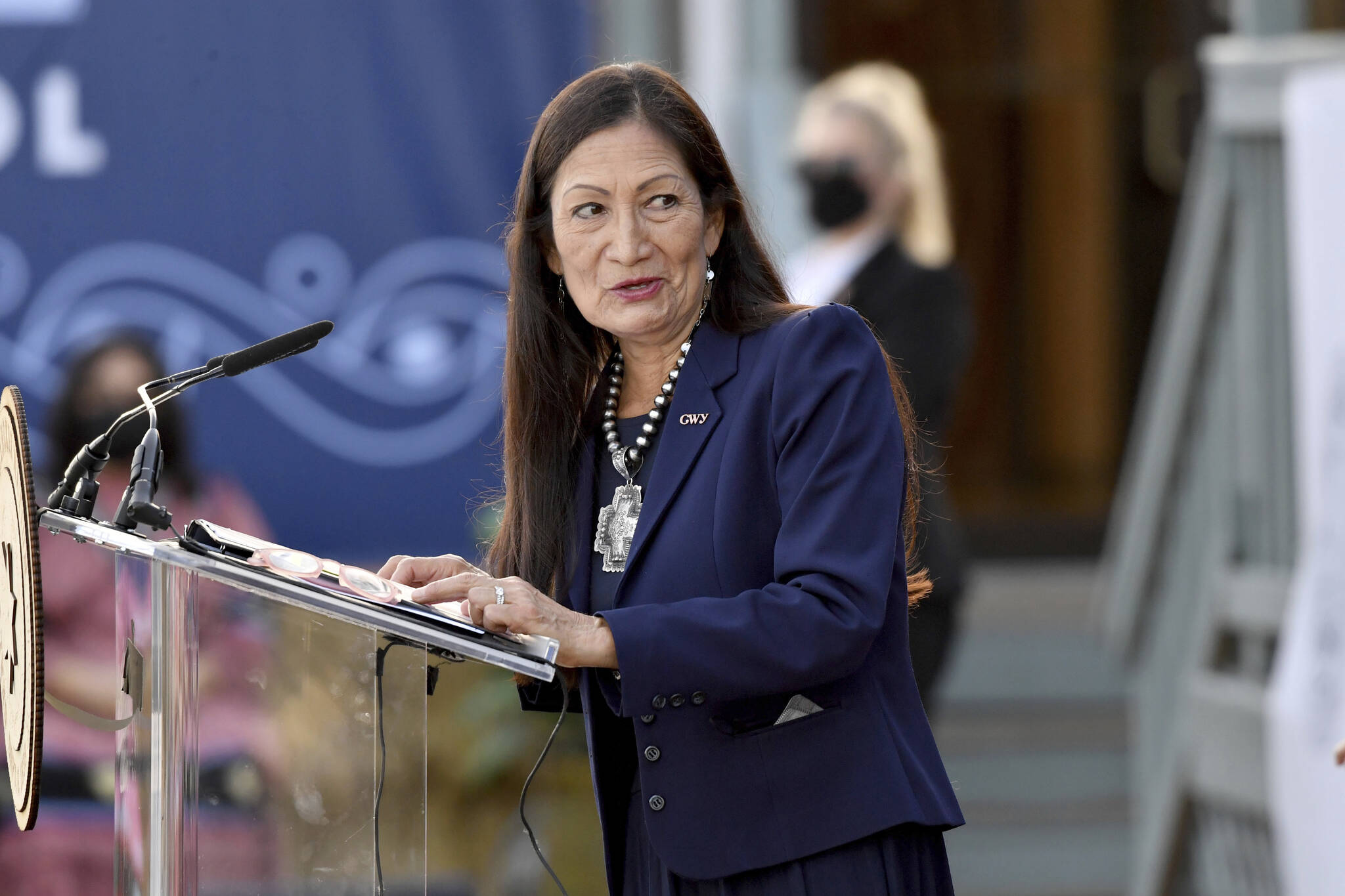 Interior Secretary Deb Haaland speaks at the Cherokee Immersion School Friday, Dec. 3, 2021, in Tahlequah, Okla. Federal officials have come up with a list of potential replacement names for hundreds of geographic features in three dozen states that include the word squaw. Haaland in November formally declared the term derogatory and initiated a process to remove the term from use by the federal government and to replace other existing derogatory place names. The list was announced Tuesday, Feb. 22, 2022. (AP Photo / Michael Woods)