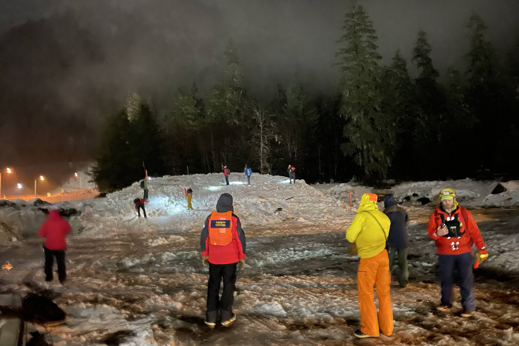 Emergency organizations and search and rescue groups practiced urban avalanche rescues in a large-scale exercise, simulating bodies in the snow and practicing probe lines. (Michael S. Lockett / Juneau Empire)