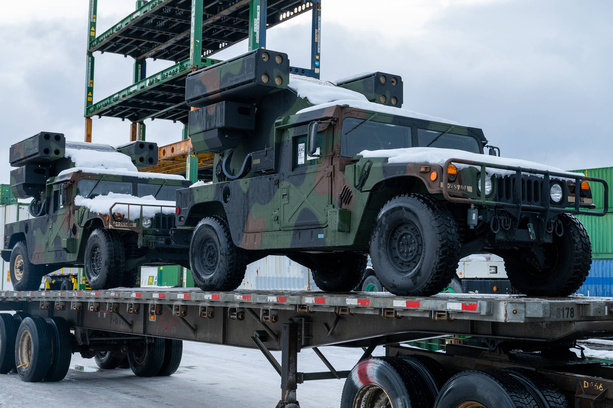 U.S. Air Force photo / Airman 1st Class Andrew Britten
Two Avenger Air Defense Systems sit on a flatbed trailer Feb. 25 at the Port of Anchorage for exercise Arctic Edge 2022.
