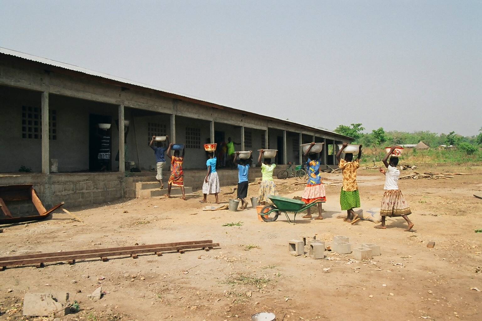 Courtesy photo / Mary McEwen 
Students help build a secondary school funded by a Peace Corps grant in Dimori, Togo in 2004. Now, a Juneau woman who helped get the first school built is helping to fund a new larger school to meet expanded demand.