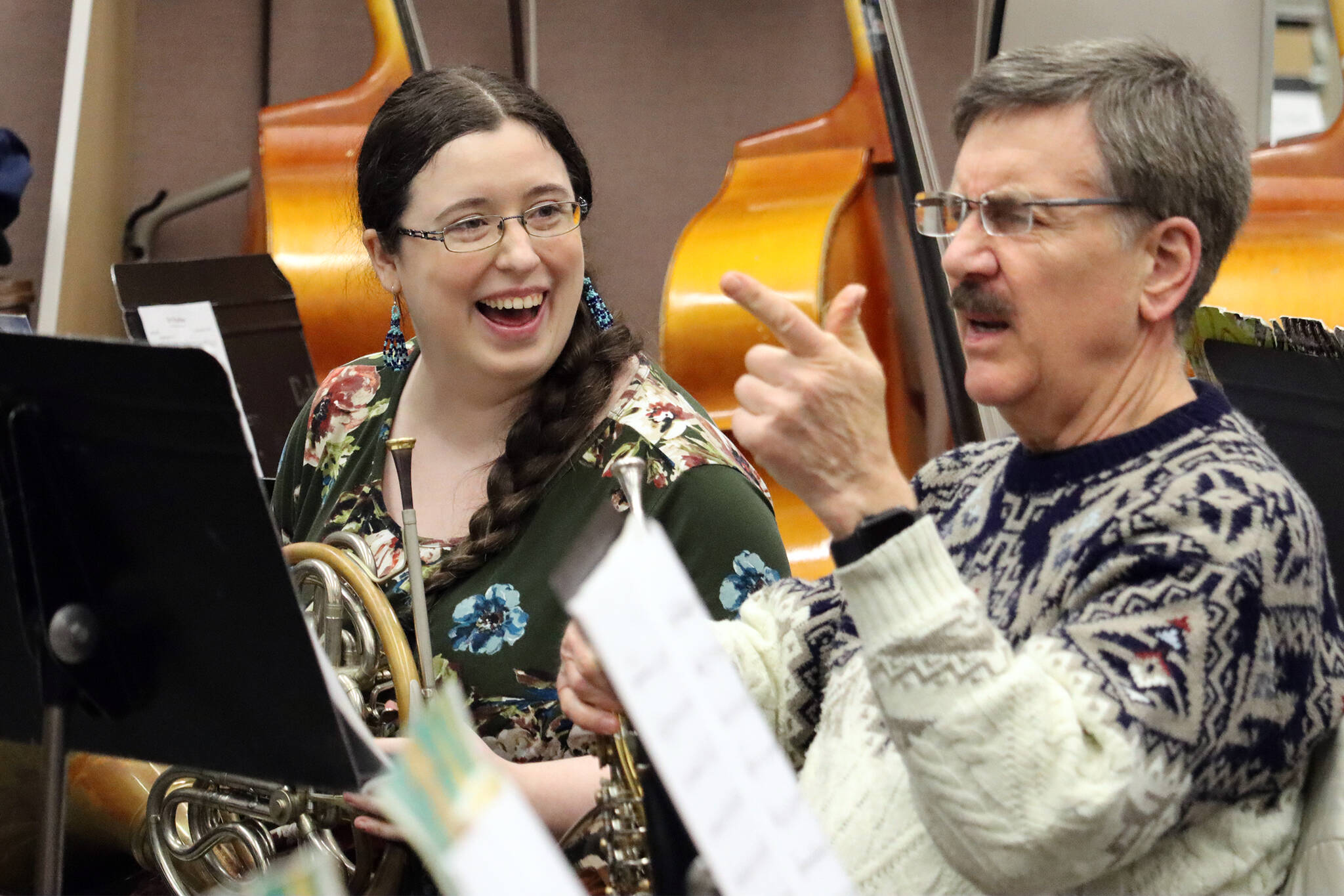 Kristina Paulick and Bill Paulick share a lighthearted moment during a break in playing.